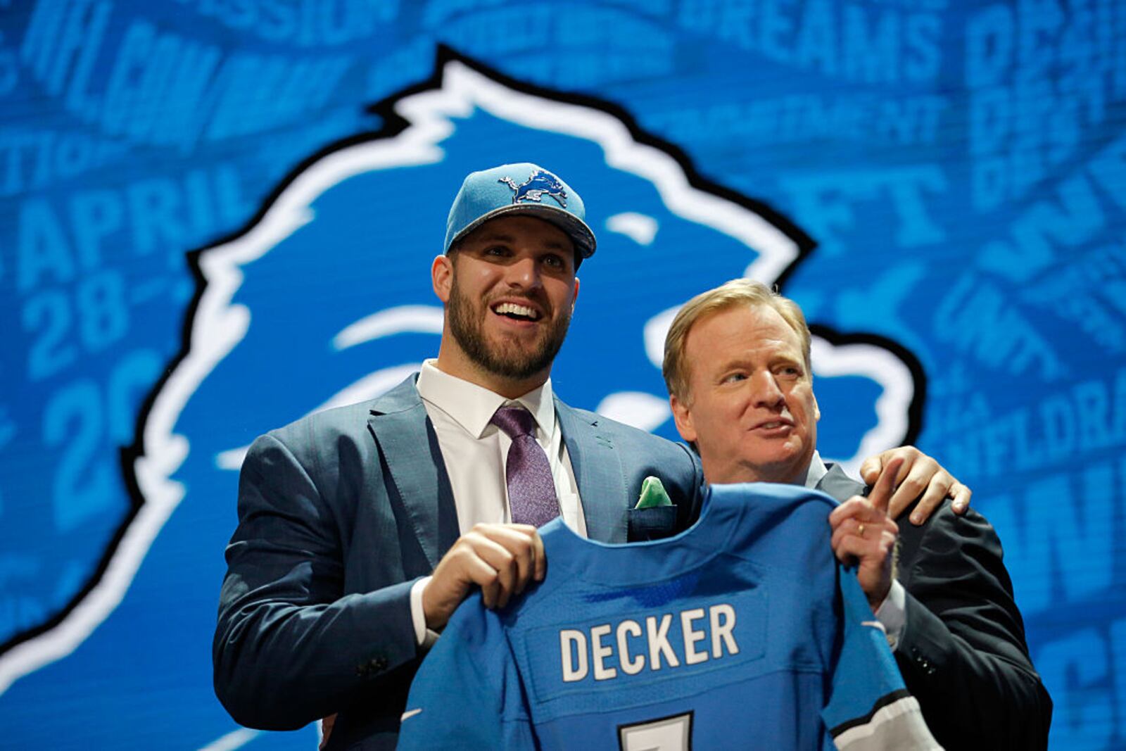 CHICAGO, IL - APRIL 28:  (L-R) Taylor Decker of Ohio State holds up a jersey with NFL Commissioner Roger Goodell after being picked #16 overall by the Detroit Lions during the first round of the 2016 NFL Draft at the Auditorium Theatre of Roosevelt University on April 28, 2016 in Chicago, Illinois.  (Photo by Jon Durr/Getty Images)