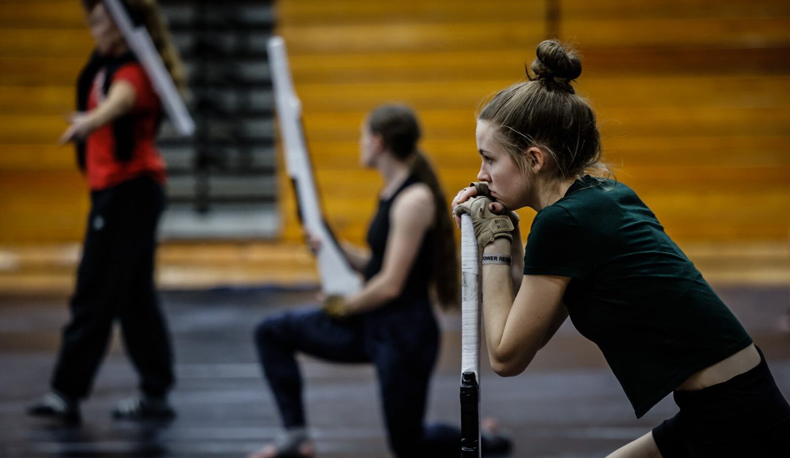 Miamisburg High School color guard team member Chloe Orwick, right,  listens to instructions during practice Thursday April 4, 2024. The WGI Championships are set to launch Thursday, April 11, 2024. JIM NOELKER/STAFF


WGI championships