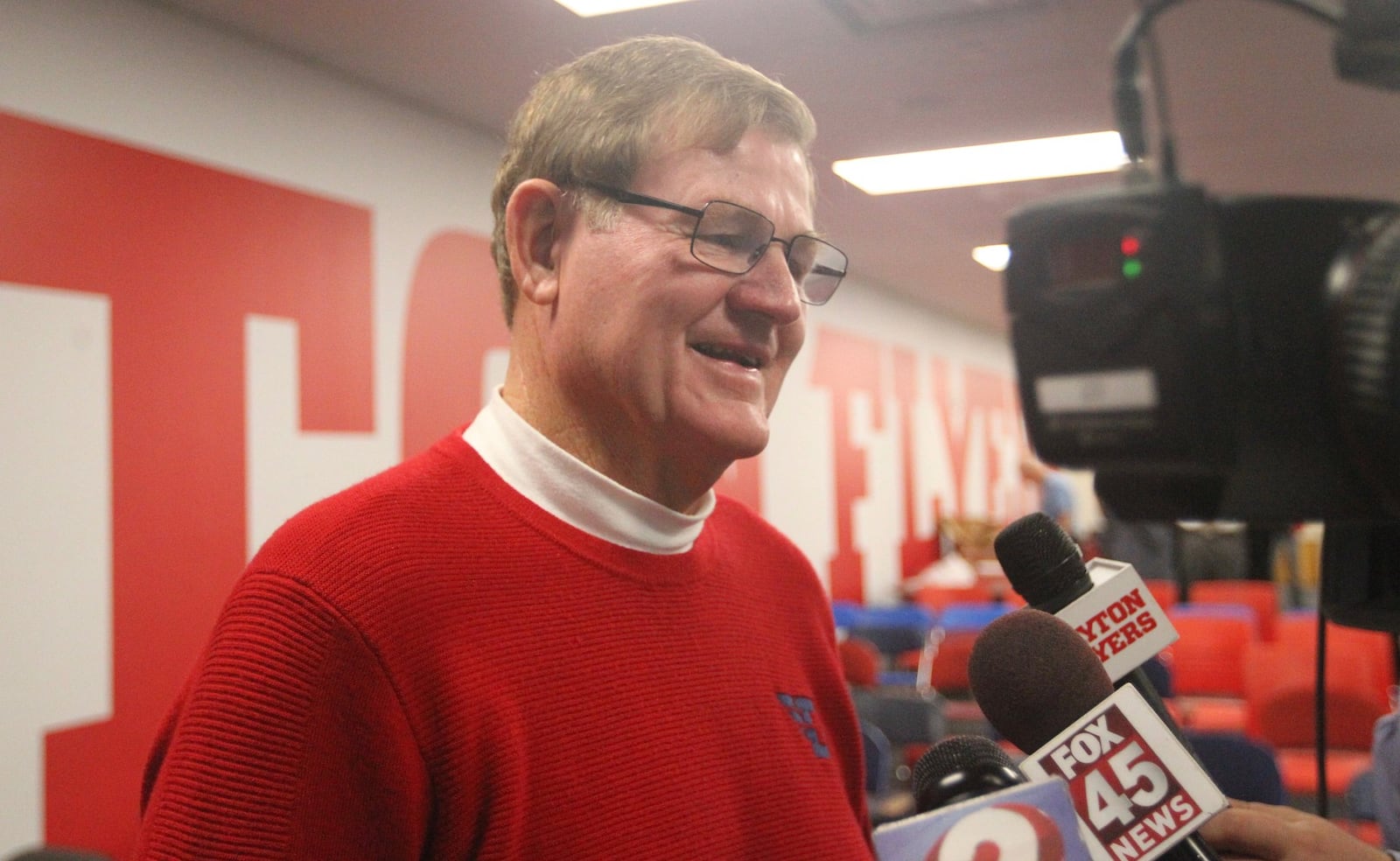 Dayton coach Mike Tucker talks to reporters after hearing the team’s name called on the NCAA selection show Monday, Nov. 7, 2016, at the Frericks Center. David Jablonski/Staff