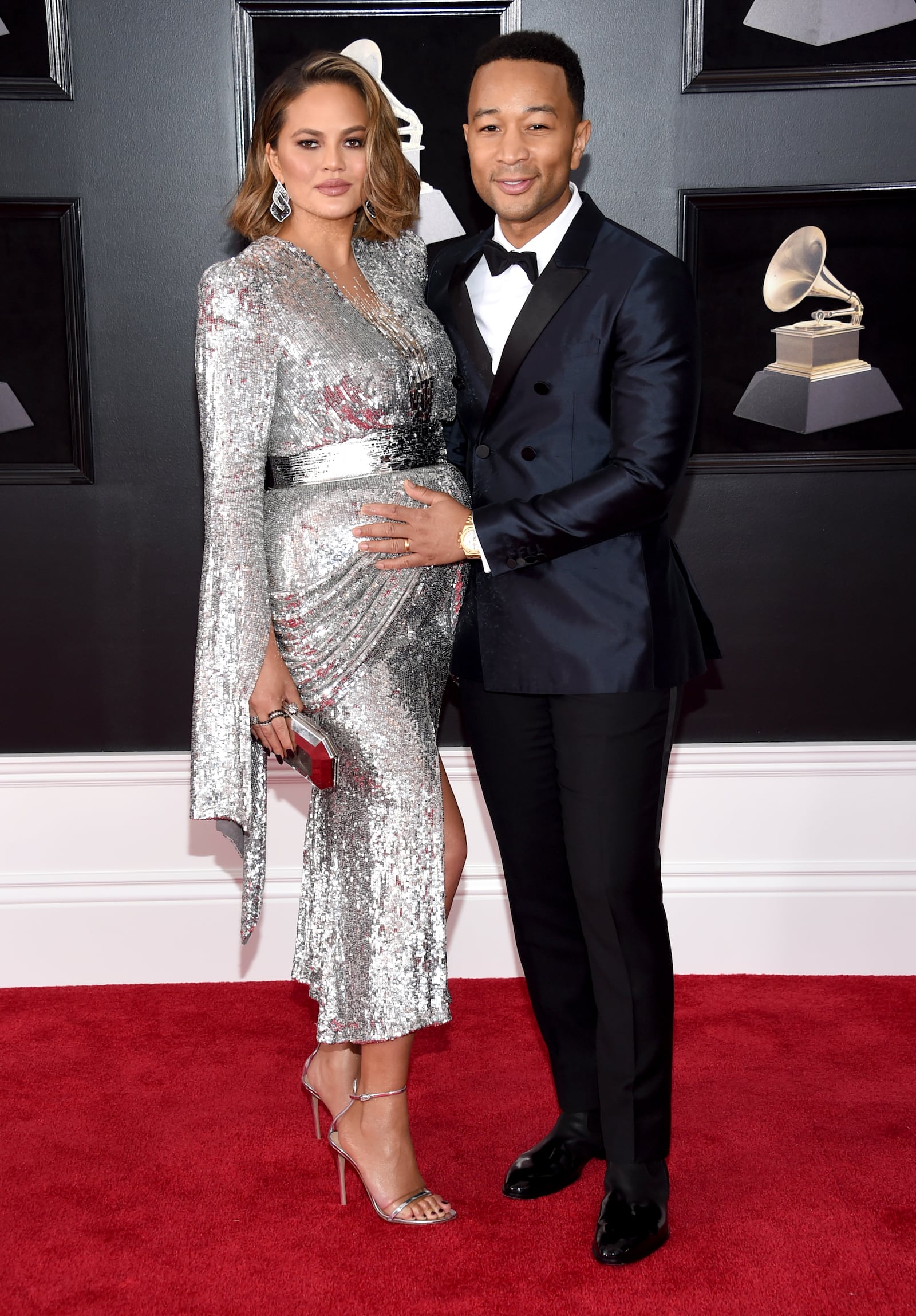 Chrissy Teigen, left, and John Legend arrive at the 60th annual Grammy Awards at Madison Square Garden on Sunday, Jan. 28, 2018, in New York. (Photo by Evan Agostini/Invision/AP)