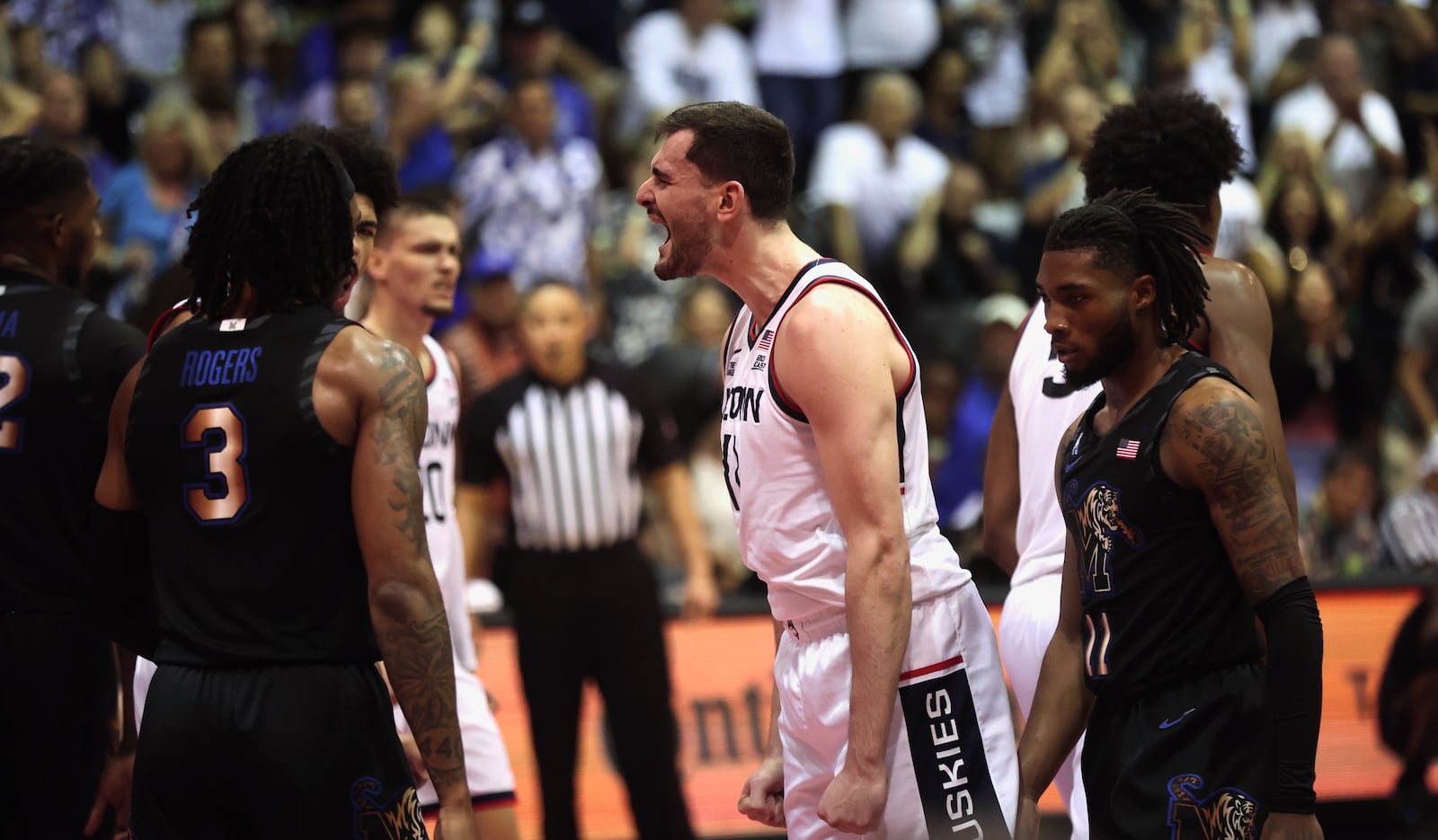 Connecticut's Alex Karaban reacts to a basket against Memphis in the Maui Invitational on Monday, Nov. 25, 2024, at the Lahaina Civic Center. David Jablonski/Staff