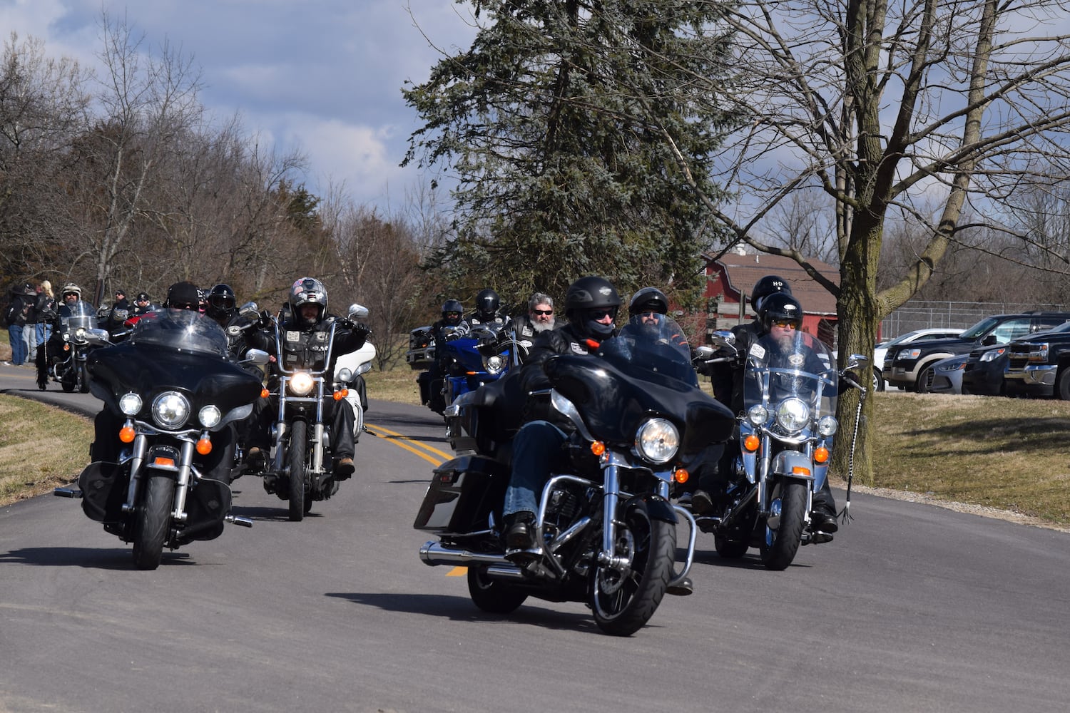 PHOTOS: Thousands of Outlaws attend motorcycle gang leaders funeral at Montgomery County Fairgrounds.