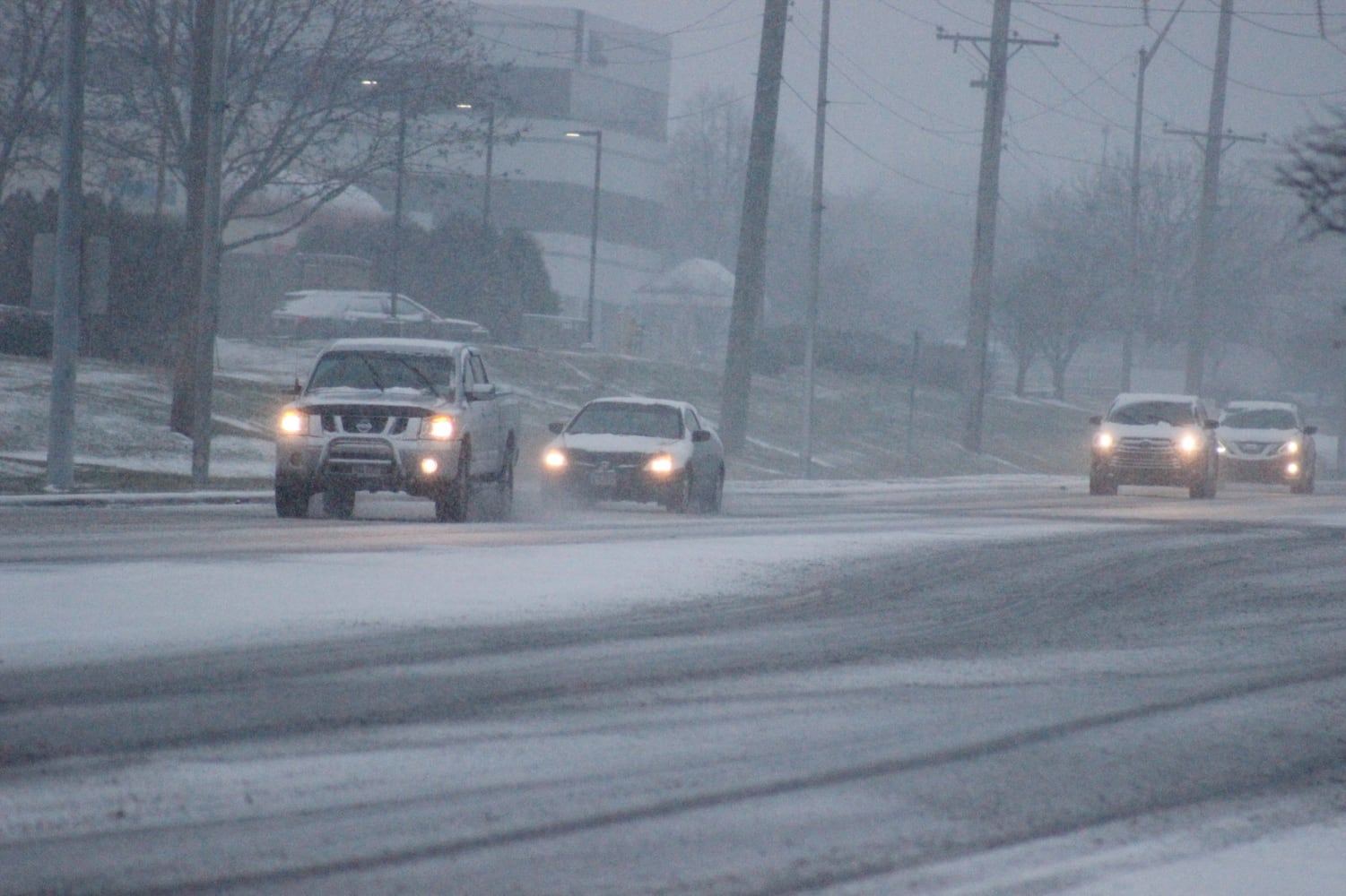 PHOTOS: Snowstorm covers region Saturday