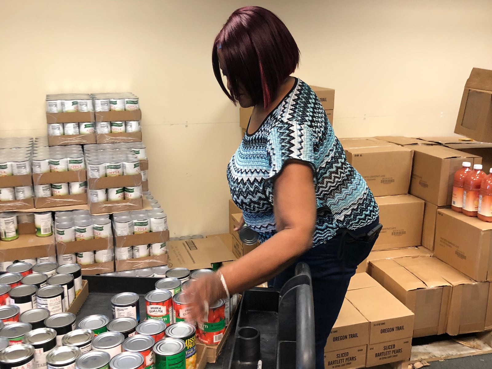 The volunteers and staff at Good Neighbor House work in the dental area, the pantry, the medical offices and the dispensary.