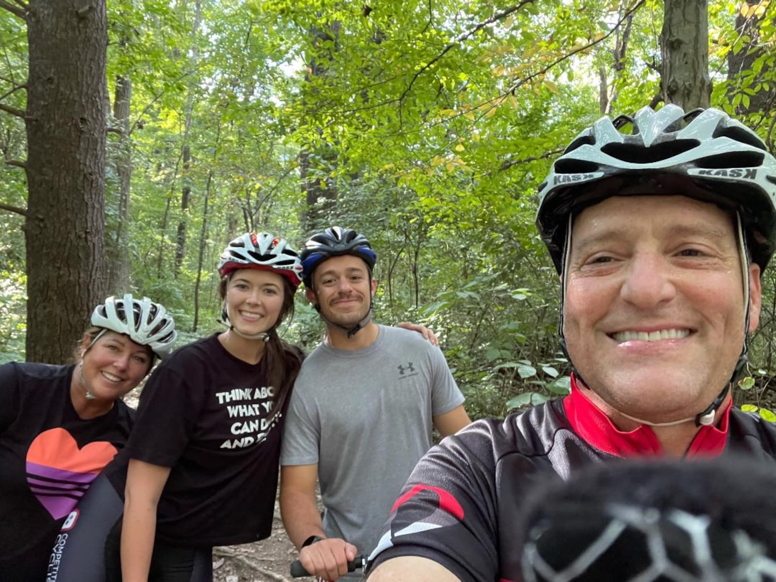 Paul (right) and Teresa Colavincenzo (left) with Teresa’s daughter Olivia and her fiancé Michael.  on a mountain biking excursion. Contributed Photo