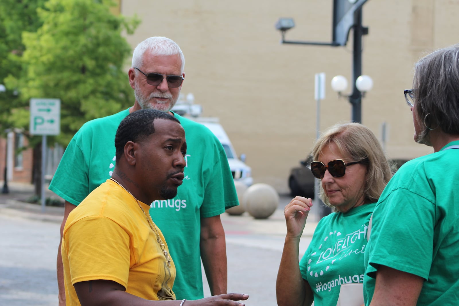 Dion Green and Michael Turner in the Oregon District for the second anniversary of the Aug. 4, 2019, mass shooting. Green's father and Turner's son were killed in the rampage. CORNELIUS FROLIK / STAFF