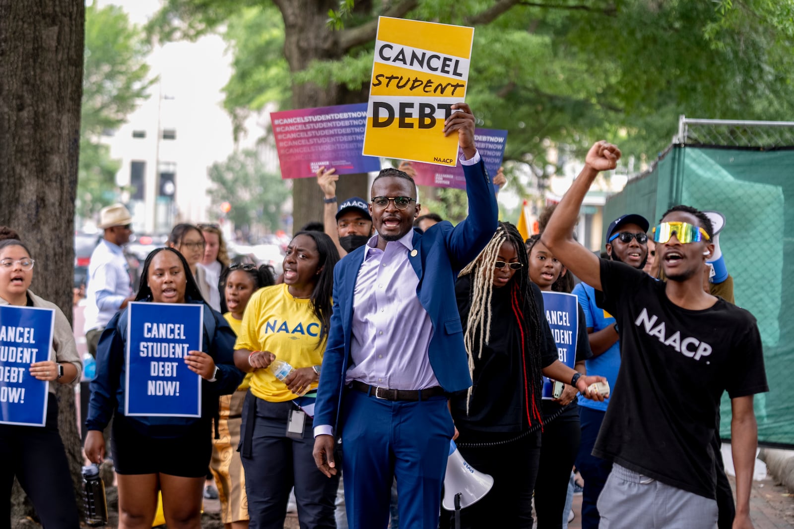 FILE - People demonstrate in Lafayette Park across from the White House in Washington, Friday, June 30, 2023, after a sharply divided Supreme Court has ruled that the Biden administration overstepped its authority in trying to cancel or reduce student loan debts for millions of Americans. (AP Photo/Andrew Harnik, File)