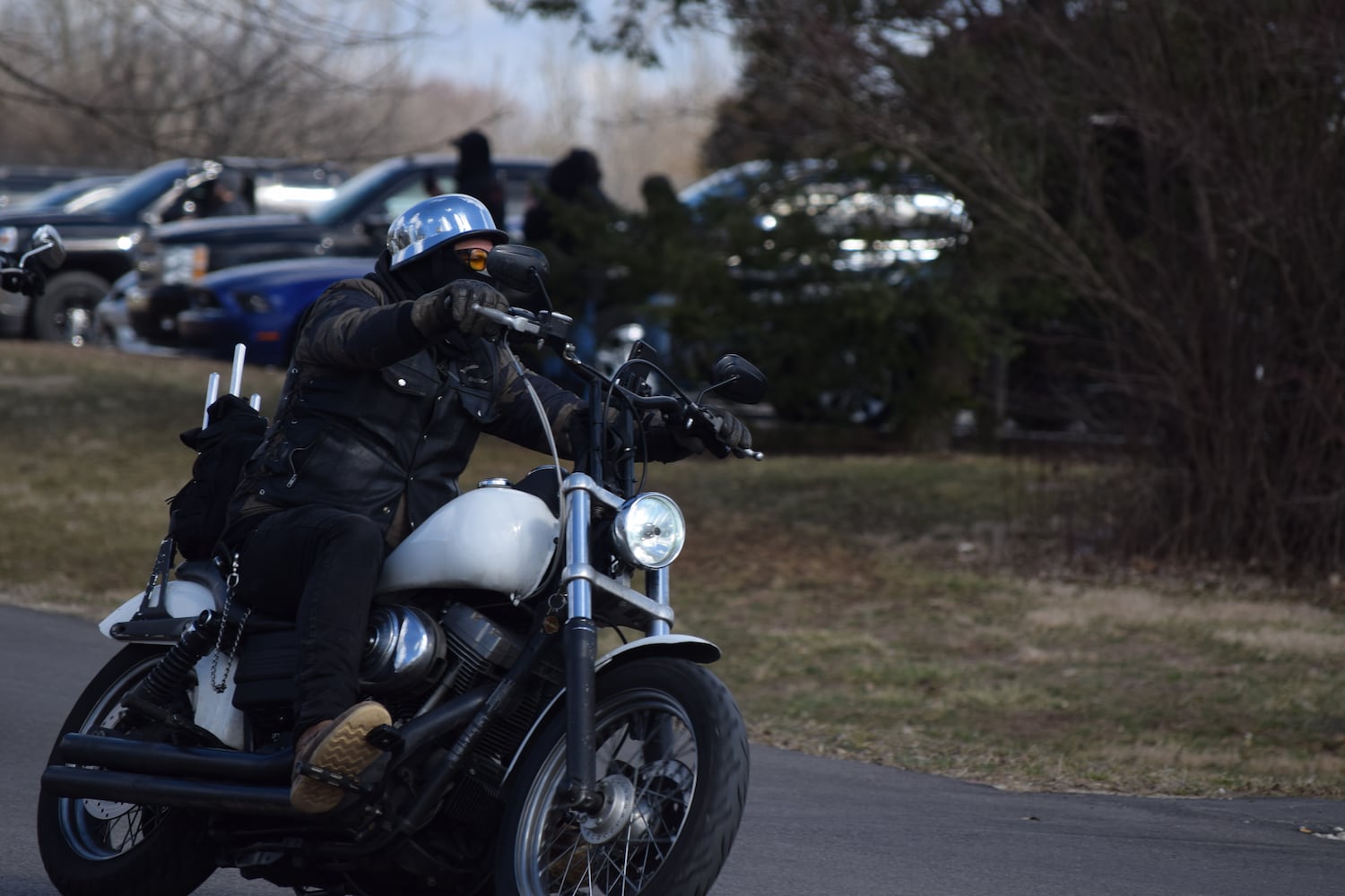 PHOTOS: Thousands of Outlaws attend motorcycle gang leaders funeral at Montgomery County Fairgrounds.