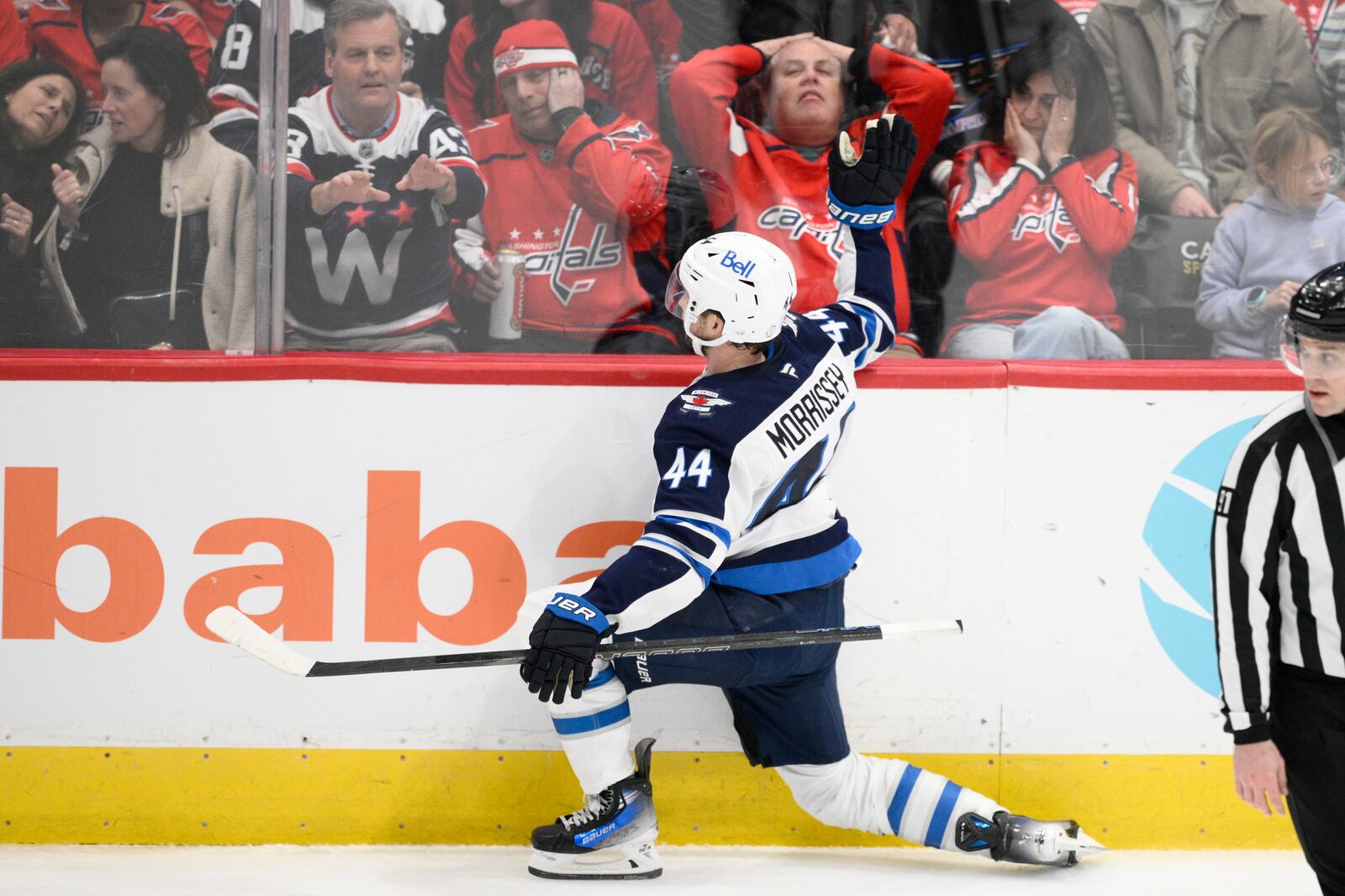 Winnipeg Jets defenseman Josh Morrissey (44) celebrates his game-winning goal during overtime of an NHL hockey game against the Washington Capitals, Saturday, Feb. 1, 2025, in Washington. (AP Photo/Nick Wass)