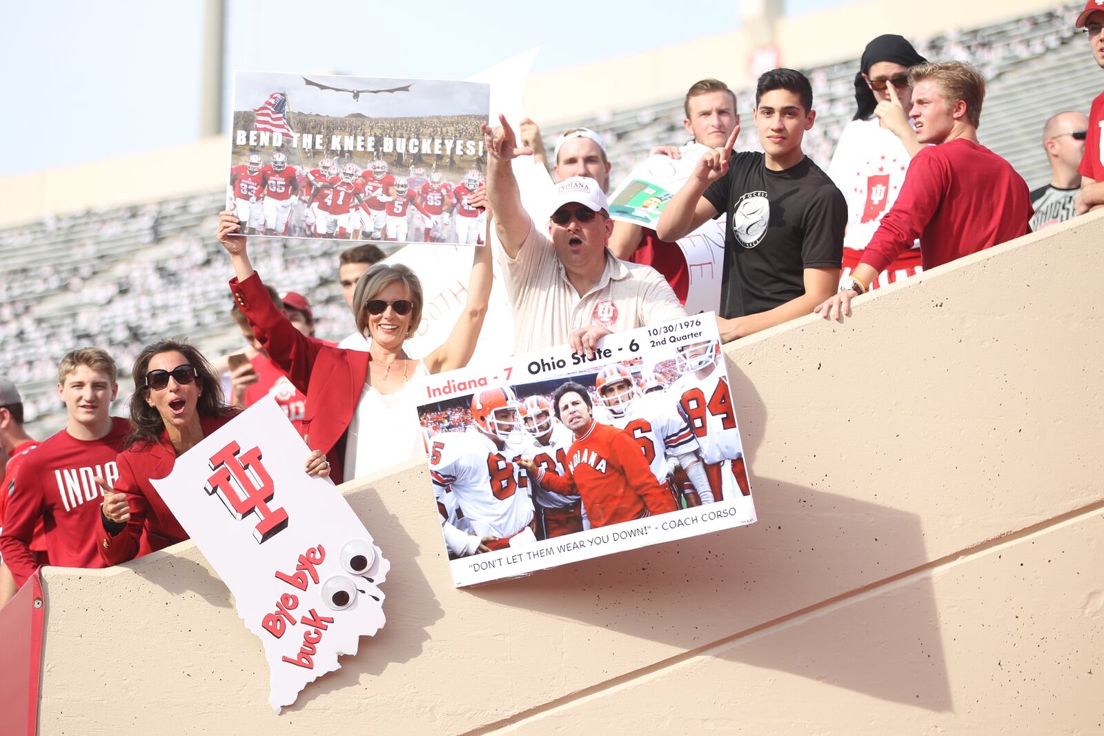 Fans show off signs before Ohio State played against Indiana on Thursday, Aug. 31, 2017, at Memorial Stadium in Bloomington, Ind.