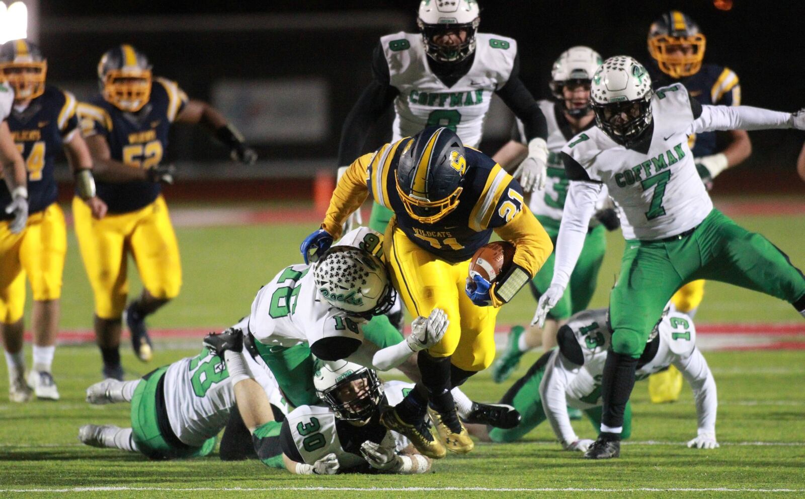 Springfield’s Tavion Smoot runs against Dublin Coffman in a Division I, Region 2 final on Friday, Nov. 22, 2019, at London High School. David Jablonski/Staff