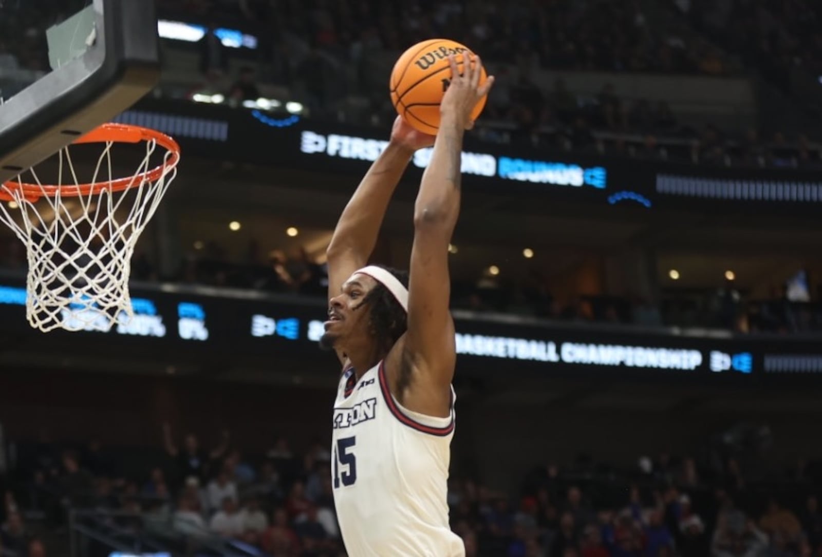 Dayton's DaRon Holmes II dunks in the opening minutes of a game against Nevada in the first round of the NCAA tournament on Thursday, March 21, 2024, at the Delta Center in Salt Lake City, Utah. David Jablonski/Staff