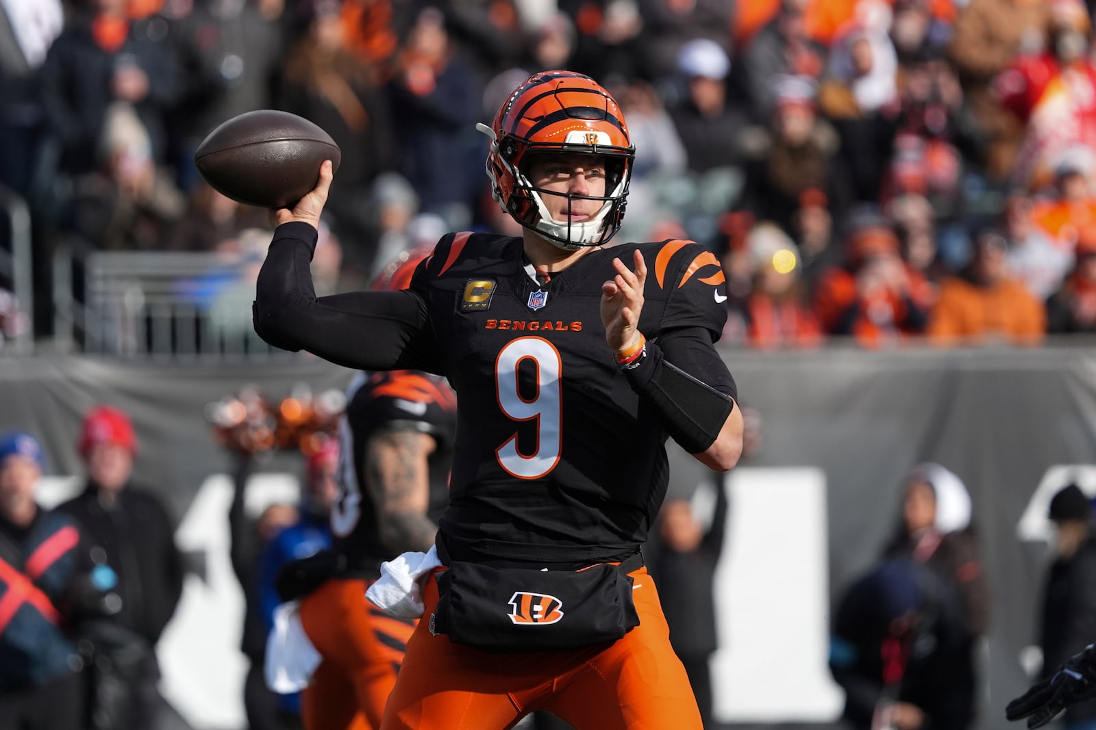 Cincinnati Bengals quarterback Joe Burrow (9) throws during the first half of an NFL football game against the Cleveland Browns, Sunday, Dec. 22, 2024, in Cincinnati. (AP Photo/Joshua A. Bickel)