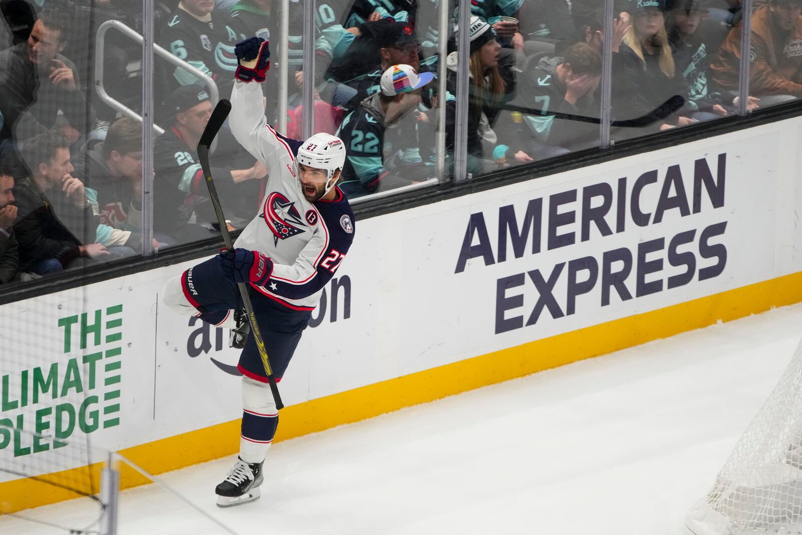 Columbus Blue Jackets center Zachary Aston-Reese react to scoring against the Seattle Kraken during the first period of an NHL hockey game Tuesday, Nov. 12, 2024, in Seattle. (AP Photo/Lindsey Wasson)