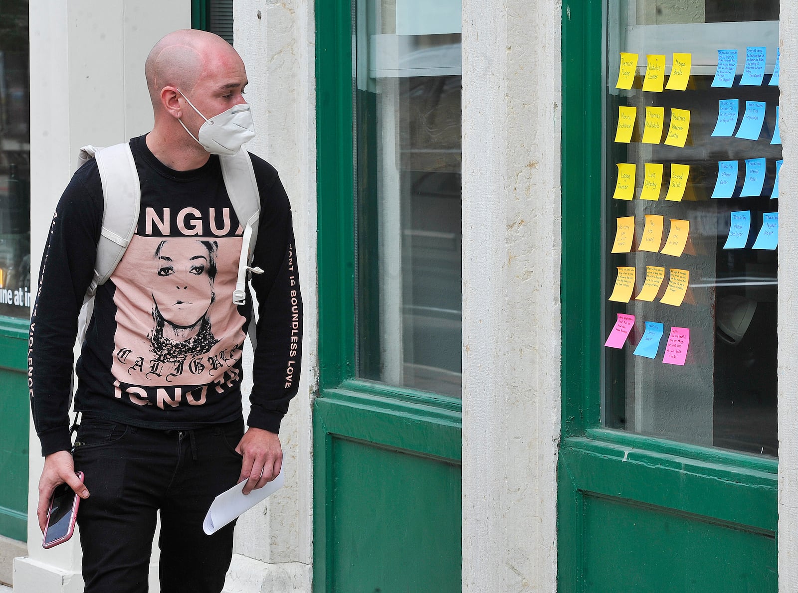 Post-it notes on the windows of businesses in the Oregon District Monday, Aug. 3, 2020.