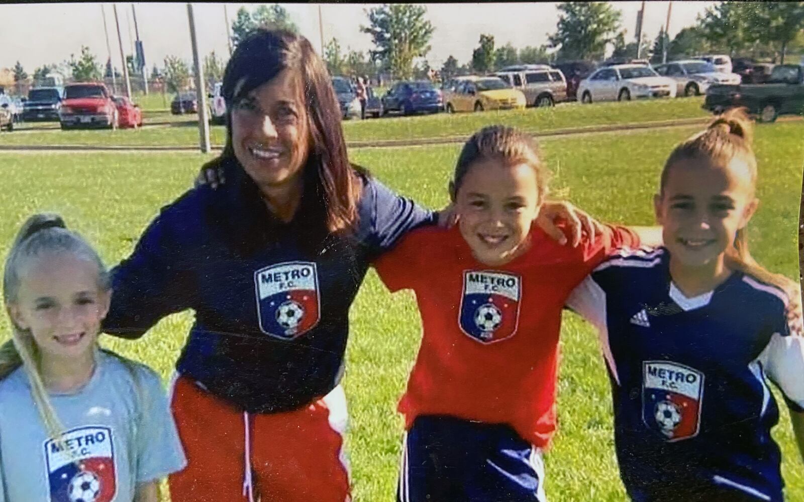 Raiff coached children through the Metro Soccer Club for 15 years. L-R nieces Ava Peck, Raiff, Dara Russo, Ella Peck