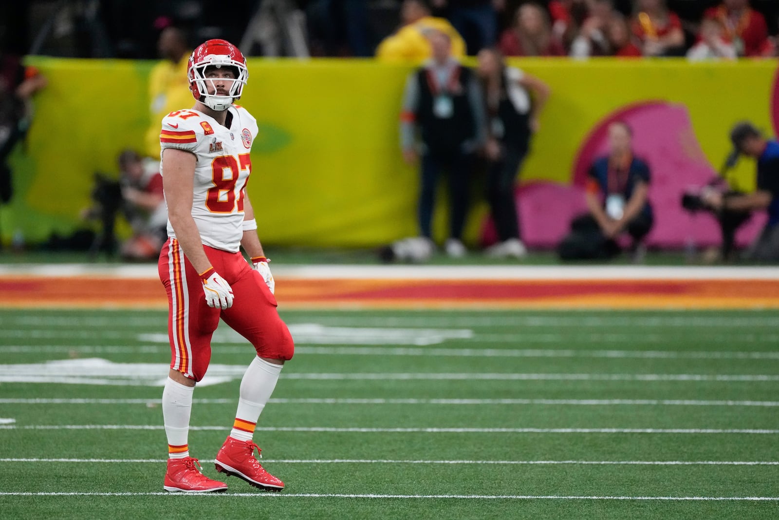 Kansas City Chiefs tight end Travis Kelce (87) walks off the field after the Philadelphia Eagles recovered a fumble by the Chiefs during the second half of the NFL Super Bowl 59 football game, Sunday, Feb. 9, 2025, in New Orleans. (AP Photo/Stephanie Scarbrough)