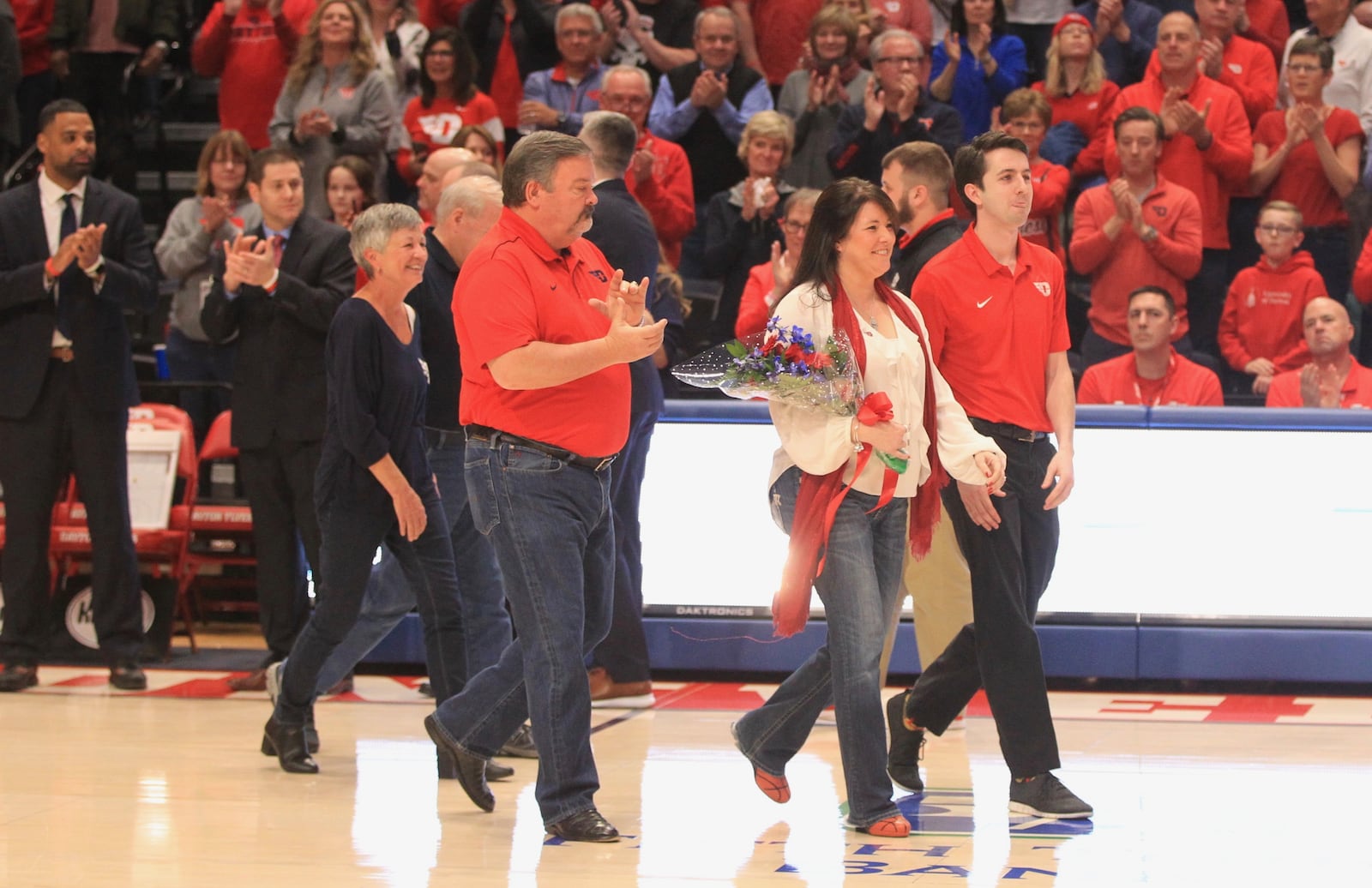 Dayton student manager Alex Reilly is honored before the last home game on Saturday, March 7, 2020, at UD Arena.