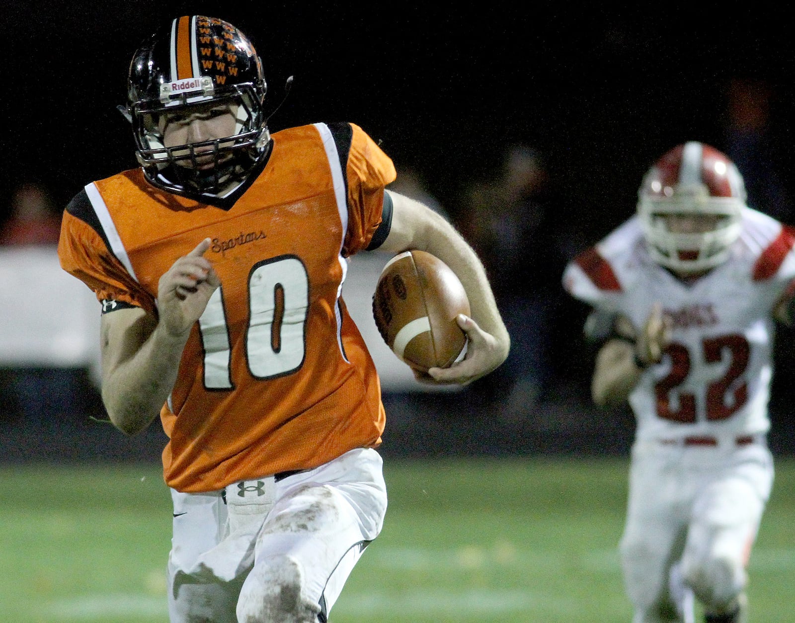 E.L. Hubbard photography Waynesville quarterback Luke Creditt runs for a touchdown against Milton-Union in the first half at Waynesville Friday, Oct. 21, 2011.