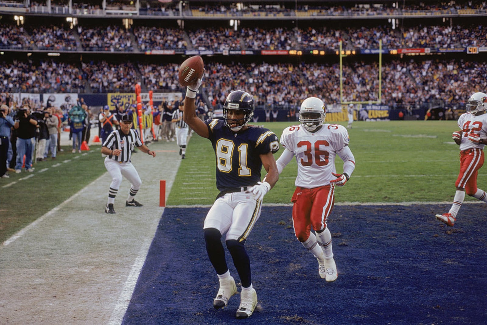 25 Nov 2001: Wide Receiver Jeff Graham #81 of the San Diego Chargers celebrating in the corner of the end zone his touch down catch with Corner Back David Barrett #36 behind him during the game against the Arizona Cardinals at the Qualcomm Stadium in San Diego, California. The Cardinals defeated the Chargers 20-17.Mandatory Credit: Stephen Dunn /Allsport