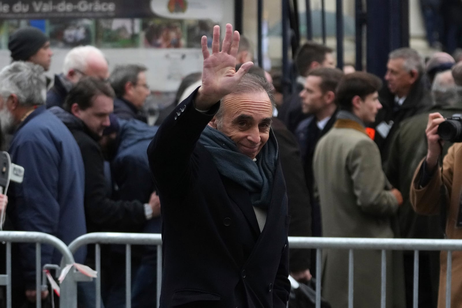 Eric Zemmour, founder of far-right party Reconquete (Renew), waves as he arrives at Notre Dame du Val-de-Grace church before a public memorial for late far-right leader Jean-Marie Le Pen, Thursday, Jan. 16, 2025 in Paris. Jean-Marie Le Pen, the founder of France's main far-right party, died on Jan.7, 2025 aged 96. (AP Photo/Thibault Camus)