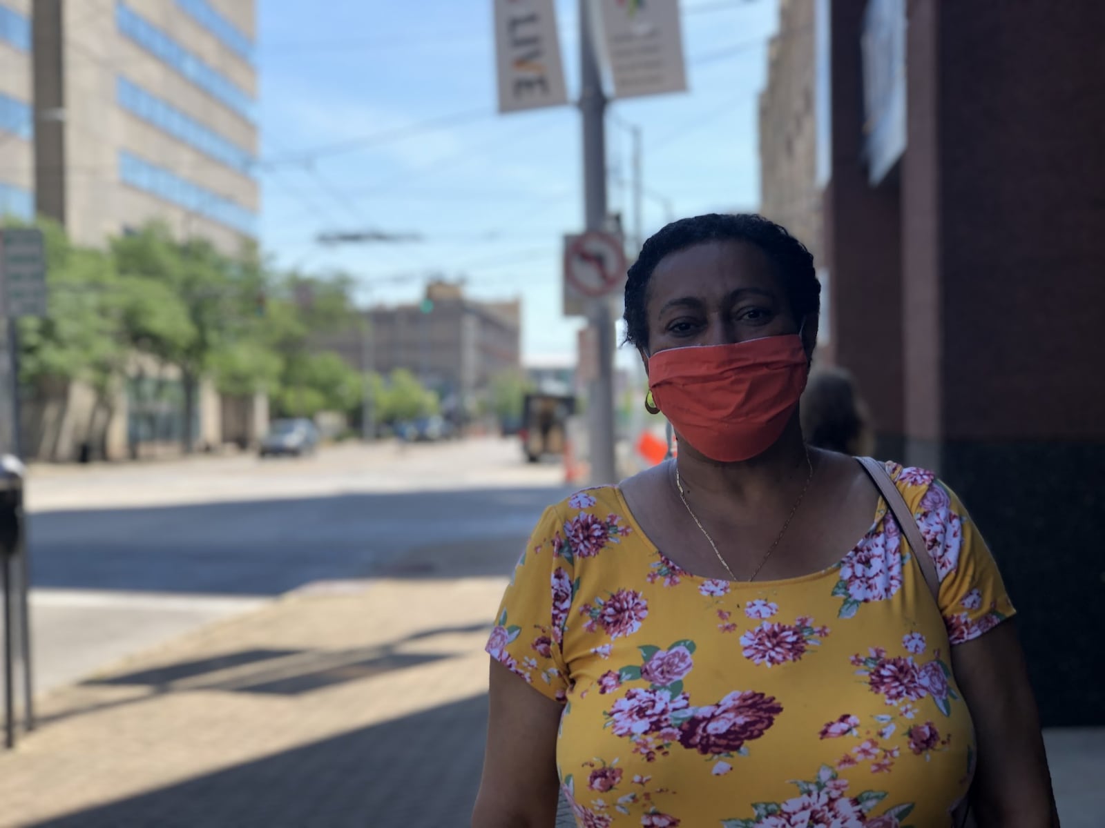 Lucille Battis, 51, of Dayton, says she started wearing a mask Thursday and believes they could help reduce the spread of the virus. CORNELIUS FROLIK / STAFF