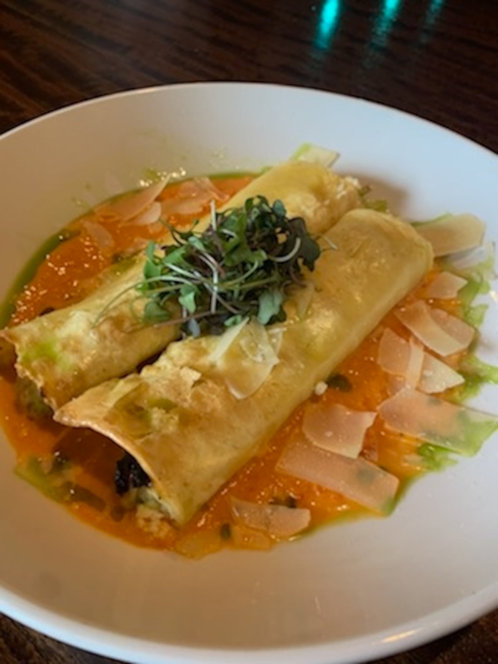 Watermark's house manicotti is filled with summer vegetable ratatouille (zucchini, squash, caramelized onion), ricotta and parmesan, topped with a smoky red
pepper cream sauce. CONTRIBUTED