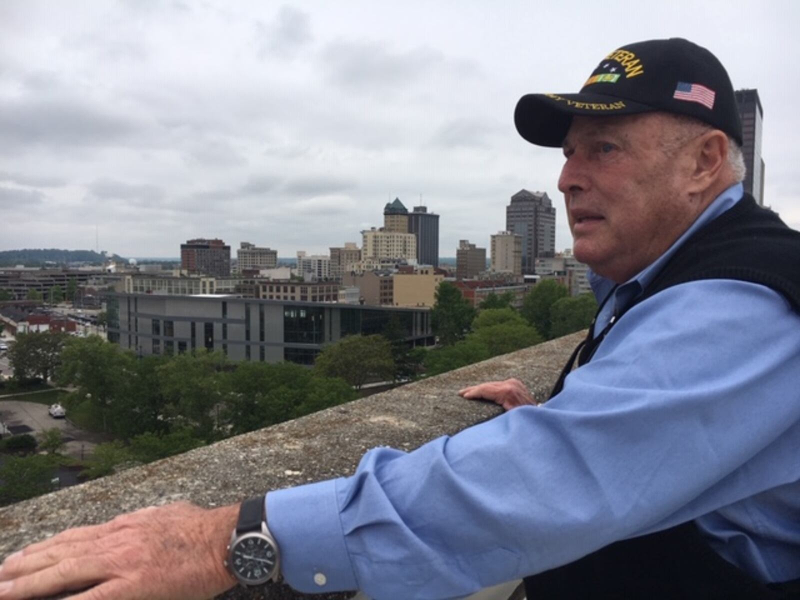 Sandy Mendelson, atop his eight-story First Street building looking over downtown Dayton, in a 2017 photo. THOMAS GNAU/STAFF