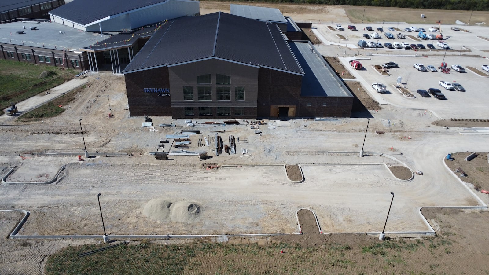 The 11,000 square foot indoor multi-sport facility at the new Fairborn High School will be built between the home stands and the fieldhouse, separate from the high school, Fairborn Treasurer Kevin Philo said. CONTRIBUTED