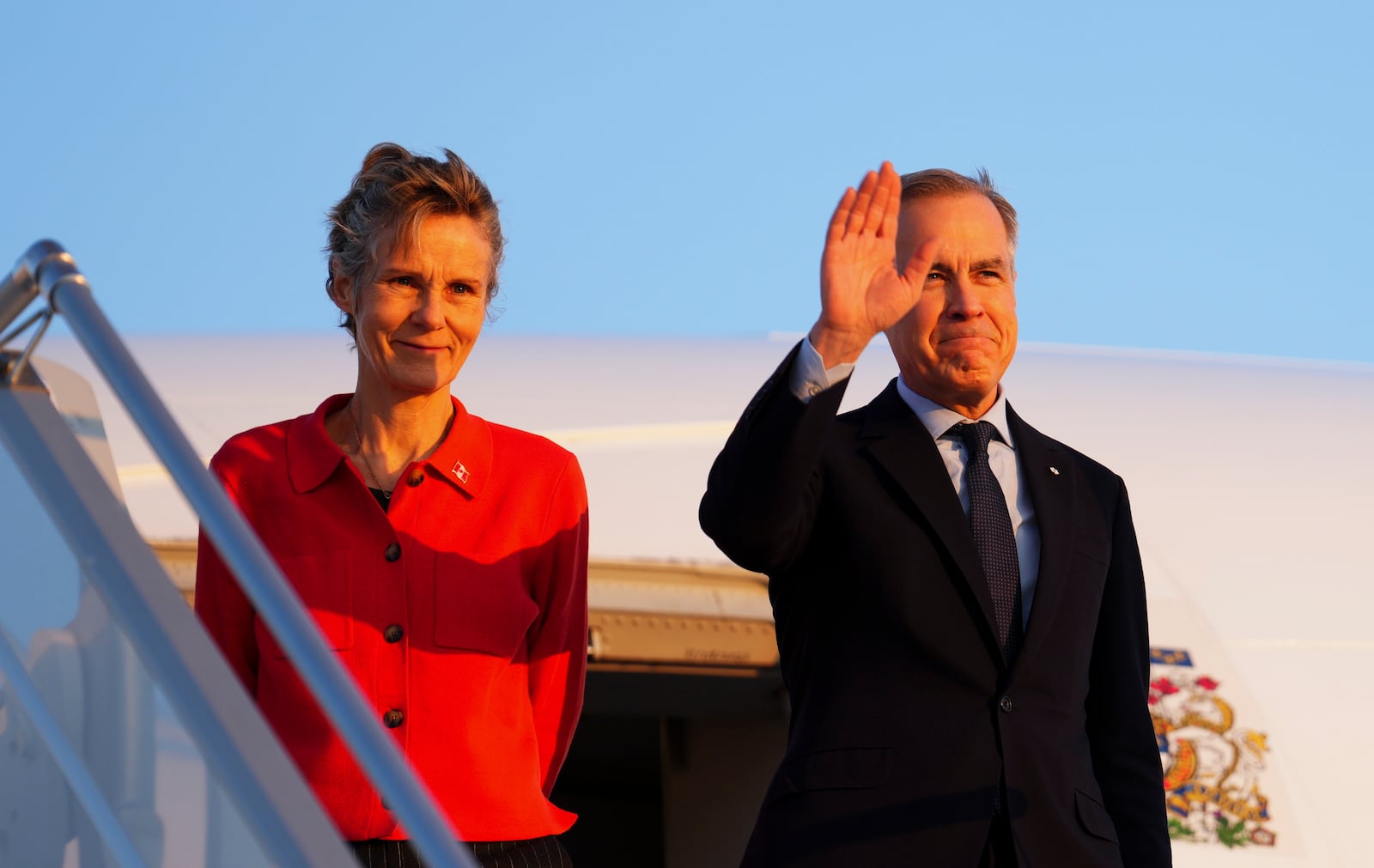 Canada's Prime Minister Mark Carney and wife Diana Fox Carney arrive in Paris, Monday, March 17, 2025. (Sean Kilpatrick/The Canadian Press via AP)