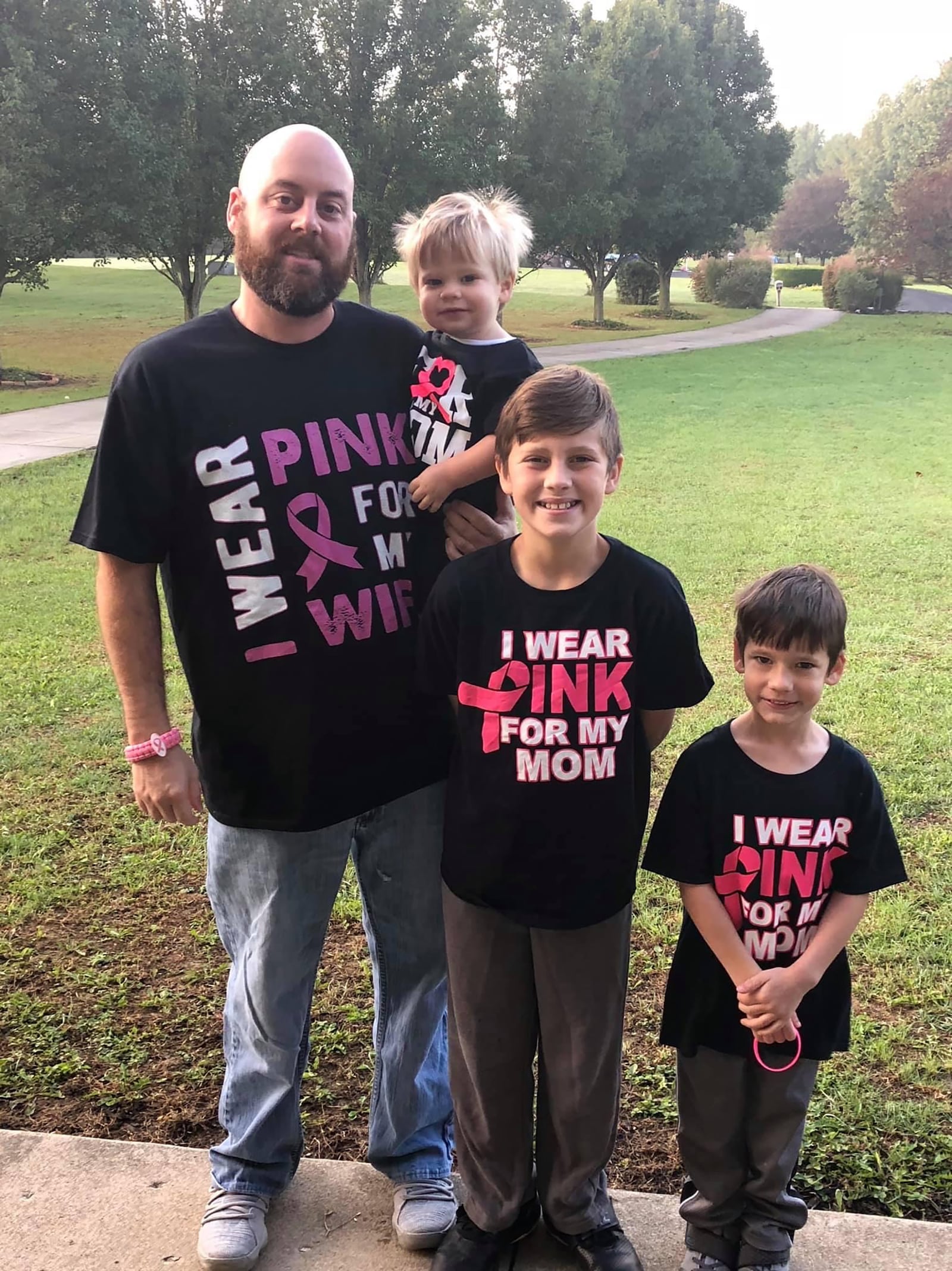 Evans credits her co workers and her family for the tremendous support she received during her cancer treatments and recovery. L-R Curtis holding Beckham, Dominic and Preston.