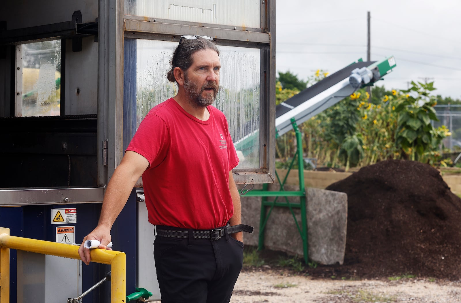 James Hoffer, garden manager at the Foodbank, talks Monday, July 29, 2024 about expanding compost operations as a part of a county partnership. MARSHALL GORBY\STAFF