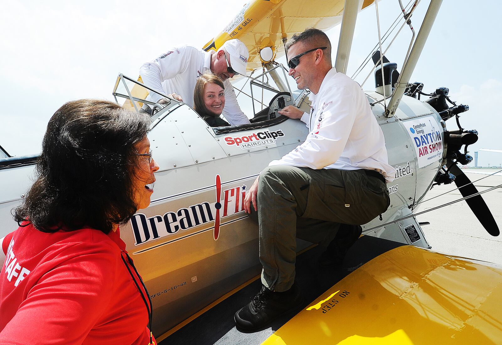 Dayton Daily News reporter Sydney Dawes gives a thumbs up showing that she was ready for her ride in a airplane Wednesday, July 19, 2023. MARSHALL GORBY\STAFF