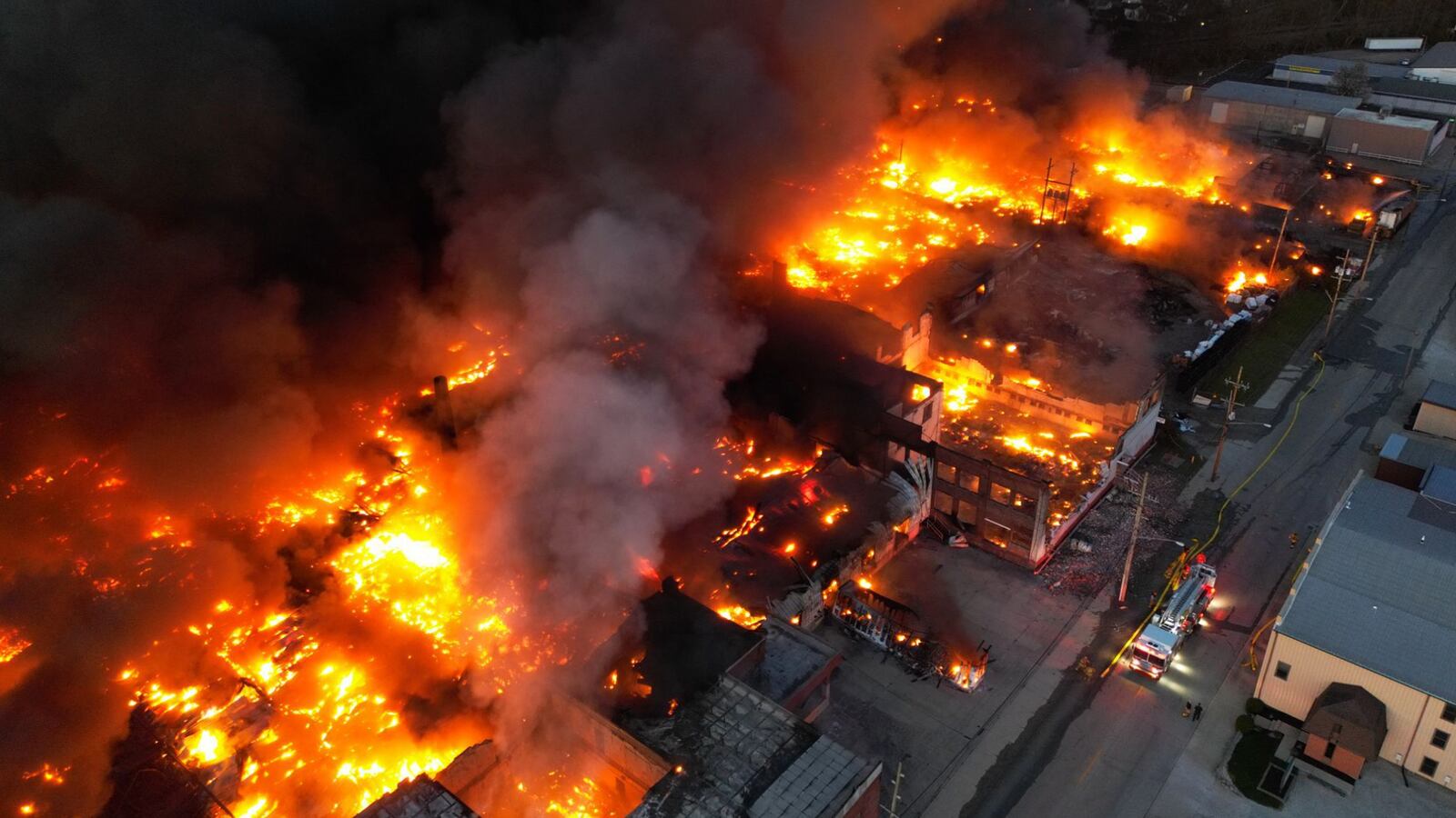 A plume of thick, black smoke traveled for miles that was coming from the massive and toxic industrial fire Tuesday, April 11, 2023, at a recycling facility in Richmond, Indiana. NICK GRAHAM/STAFF