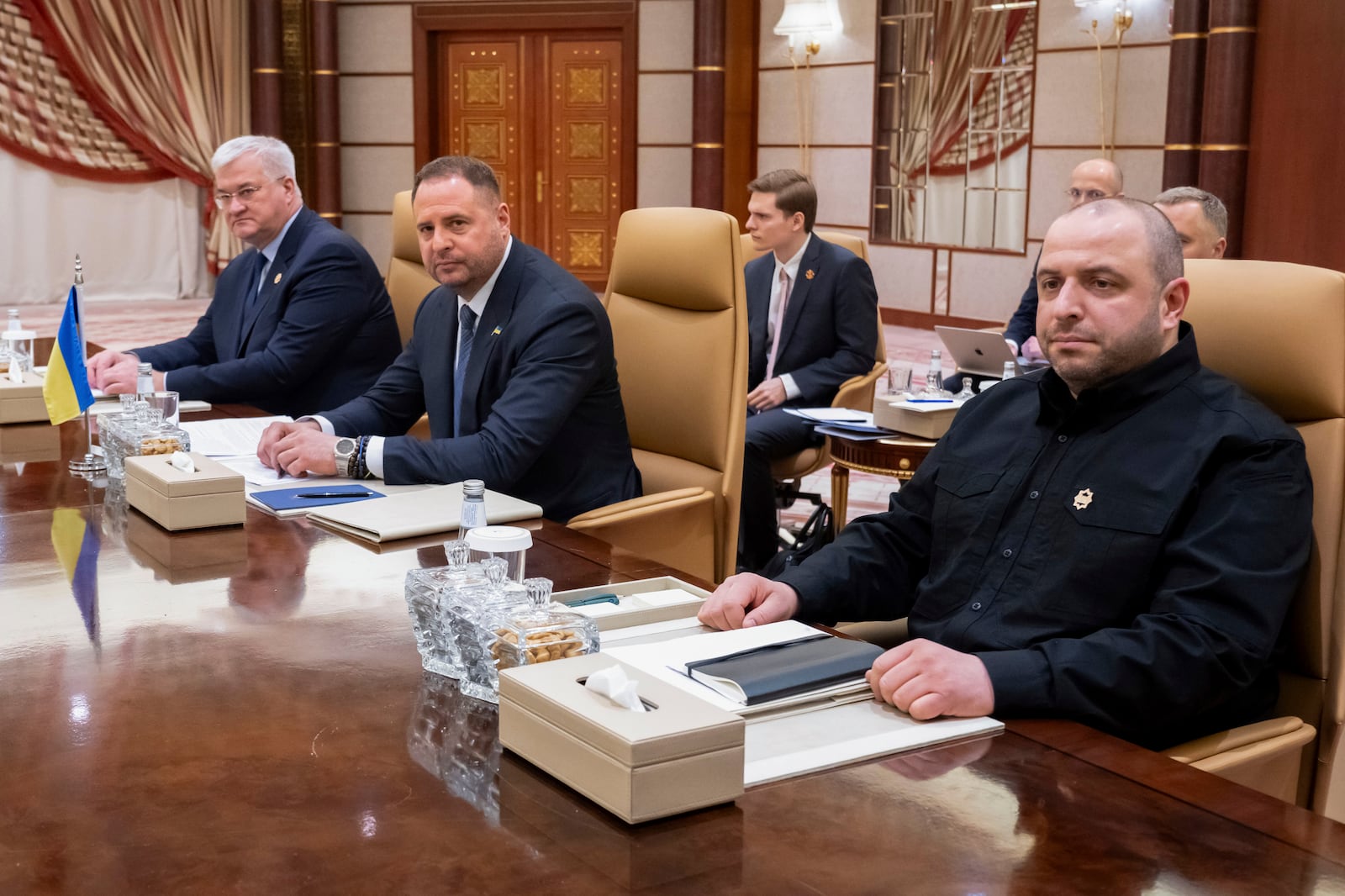 From left, Ukrainian Foreign Minister Andrii Sybiha, Ukrainian Head of Presidential Office Andriy Yermak, and Ukrainian Minister of Defense Rustem Umerovto, hold a meeting with US officials, in Jeddah, Saudi Arabia, Tuesday, March 11, 2025. (Saul Loeb/Pool Photo via AP)