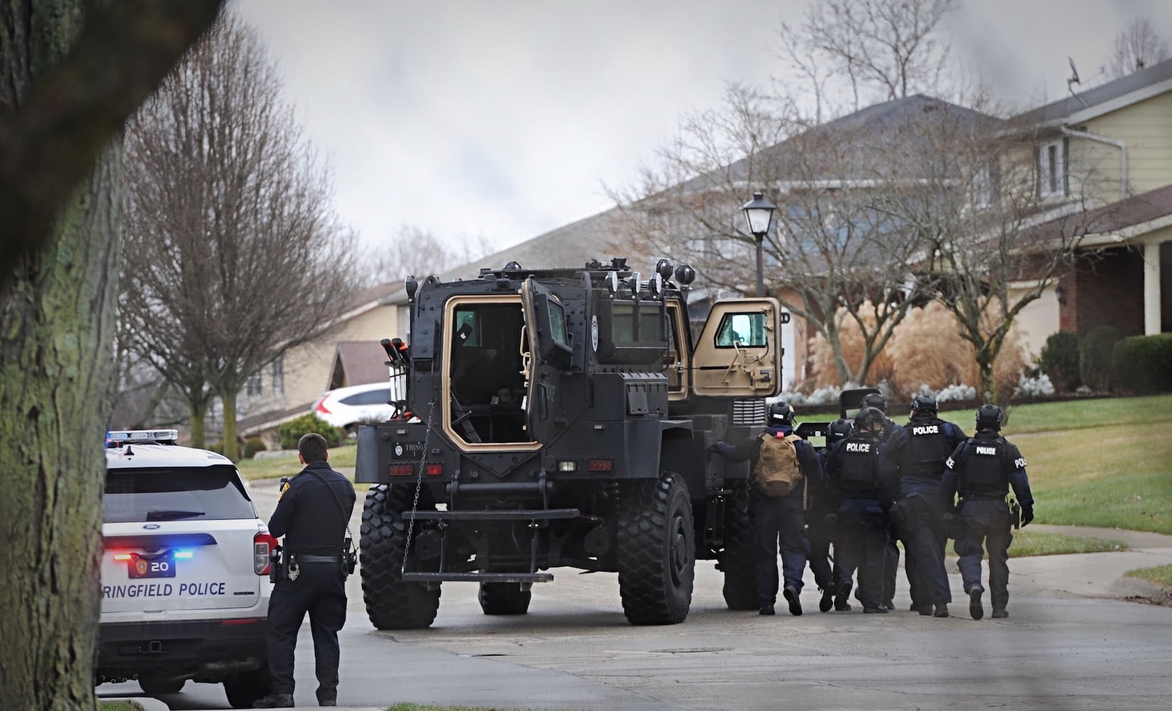 PHOTOS: Neighborhood blocked off after reported shots fired in Springfield