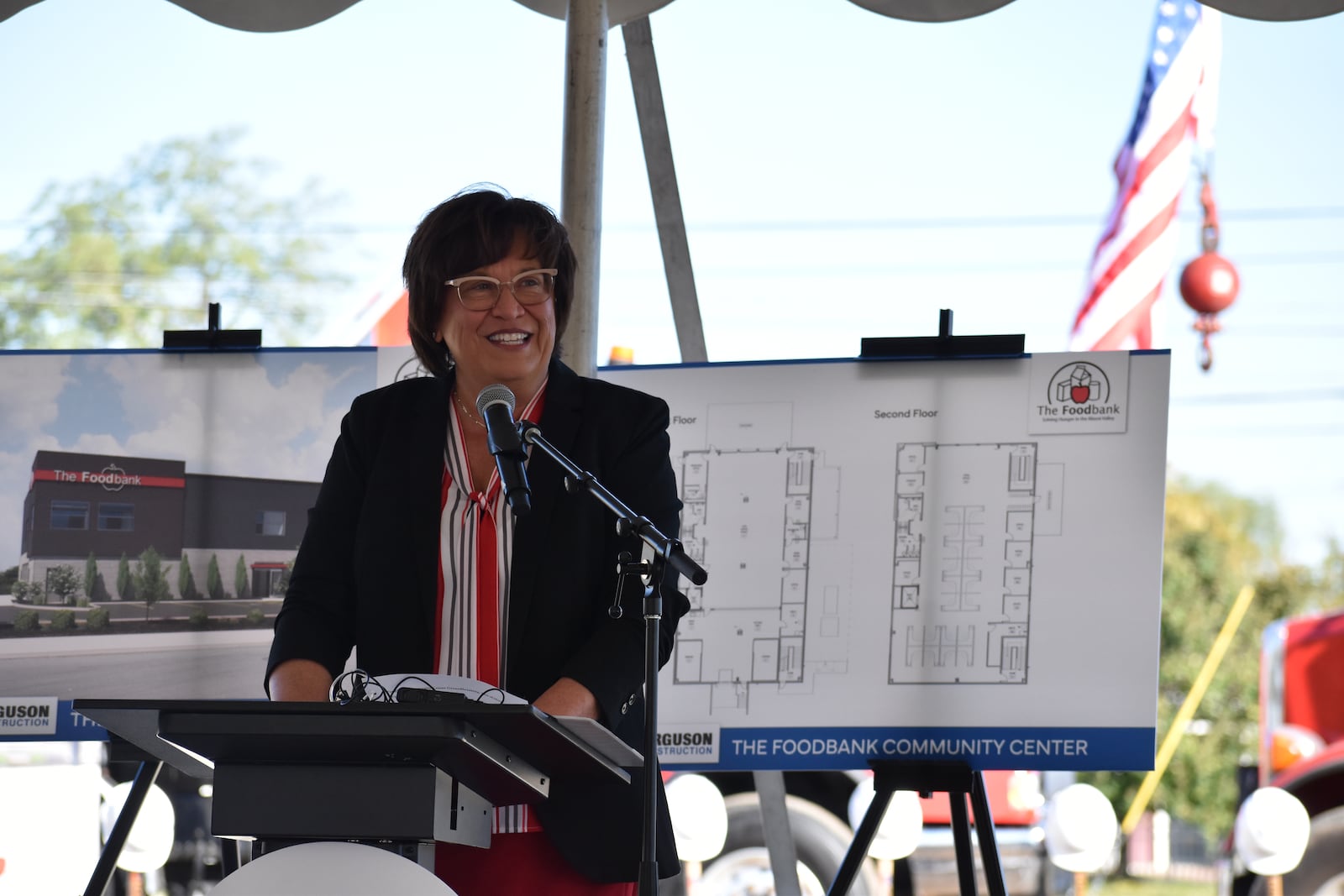 Michelle Riley, CEO of the Dayton Foodbank Inc., discusses plans for a new $4.5 million community building, which was funded in part by a Health Resources and Services Administration grant. SAM WILDOW\STAFF