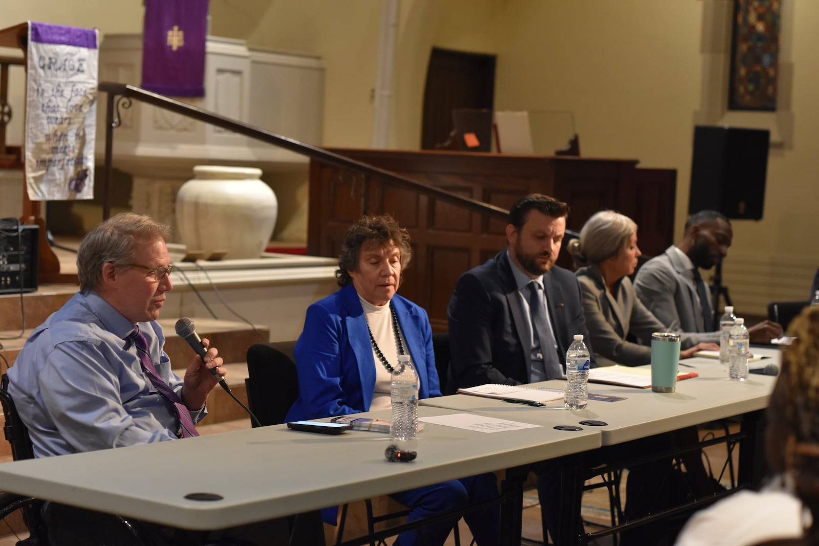 Five people running for the Dayton City Commission took part in a candidate town hall forum hosted by the Dayton unit NAACP on Monday night, March 24, 2025. The candidates (from left to right) are incumbent City Commissioner Darryl Fairchild, Valerie Duncan, C. Jacob Davis, Karen Wick and Darius Beckham. CORNELIUS FROLIK / STAFF