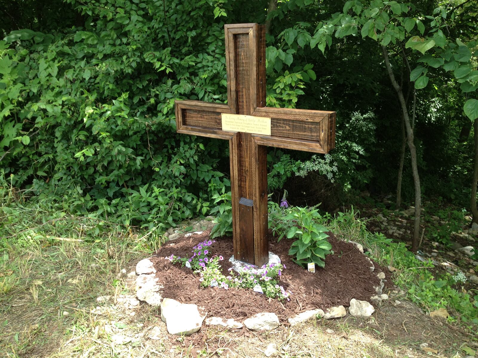 A memorial cross marks the site in Cedar Grove, Ind., where Katelyn Markham’s remains were found.