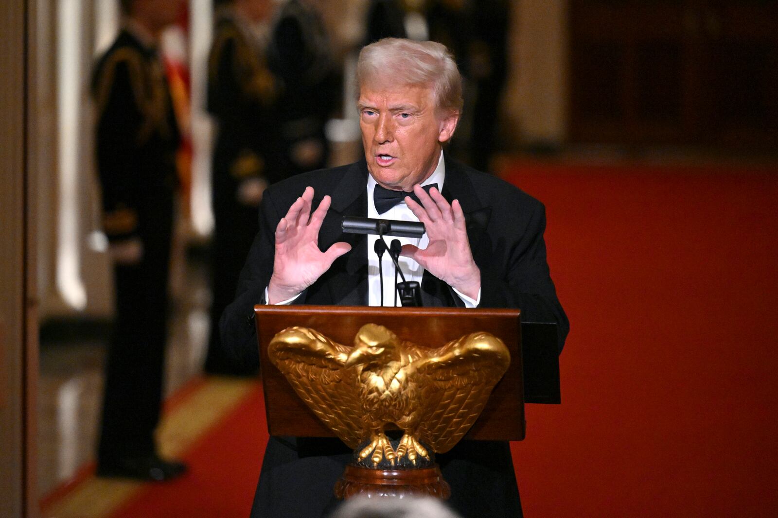 President Donald Trump addresses the National Governors Association dinner and reception in the East Room of the White House Saturday, Feb. 22, 2025, in Washington. (Pool via AP)