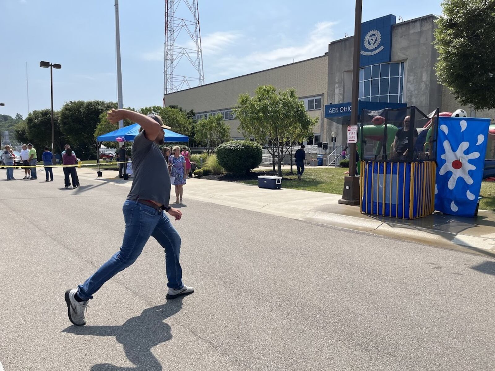 Dayton electric utility AES Ohio and the United Way celebrated an enduring partnership Wednesday. Among the fun activities: a dunking booth on the parking lot of AES Ohio's Dryden Road operations center. THOMAS GNAU/STAFF