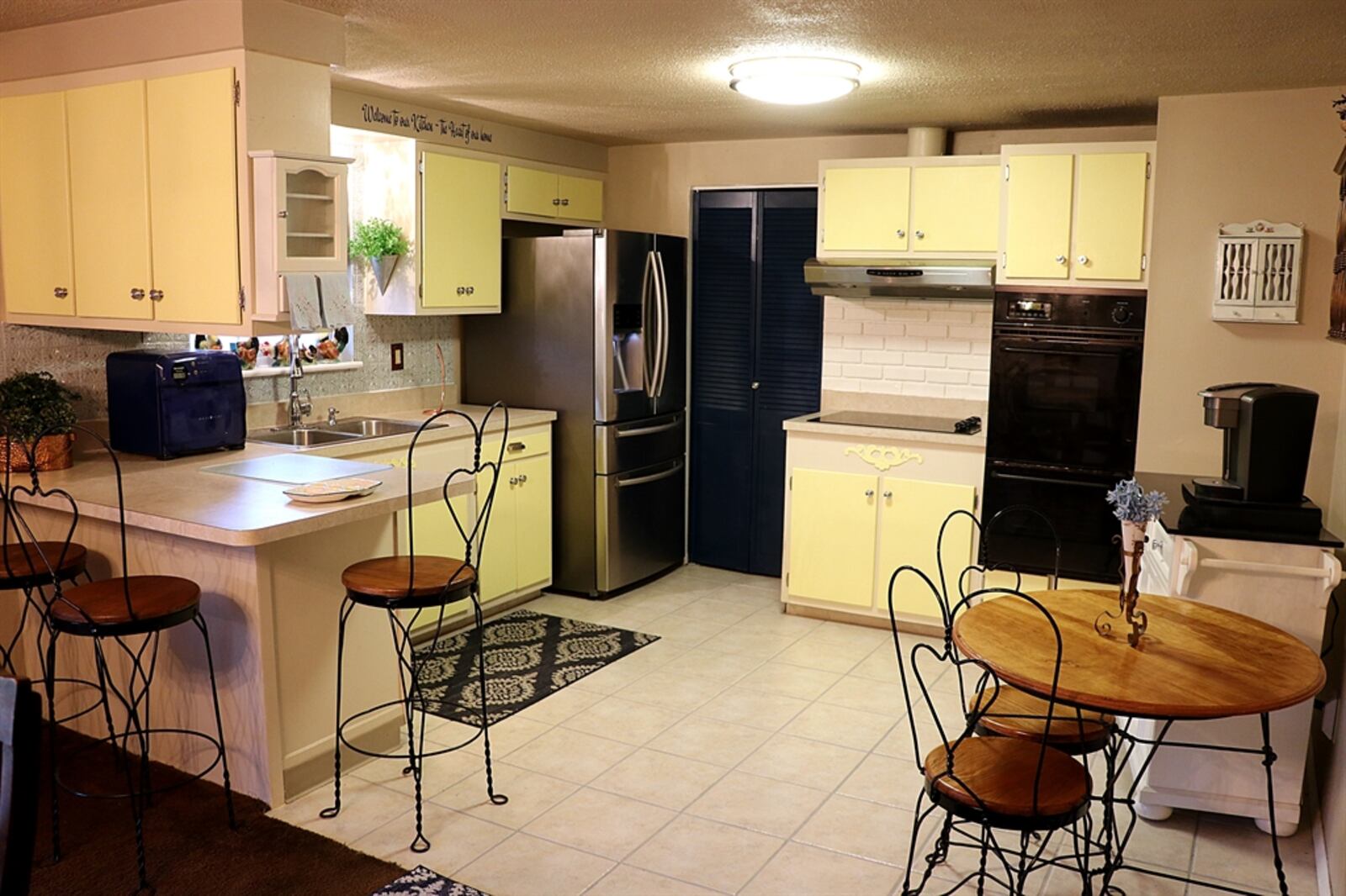 A peninsula counter between the kitchen and the spacious dining room has an extended counter that allows for breakfast bar seating for up to four. Contributed by Kathy Tyler