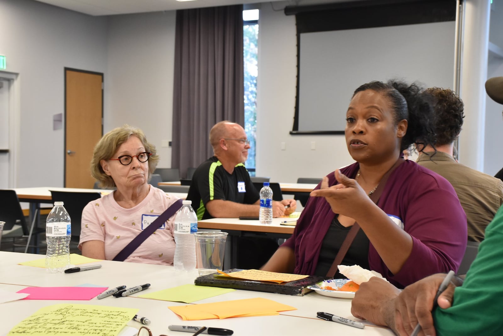 Participants in the Your Voice Ohio forum at the downtown Dayton Metro Library, Monday, Sept. 30, 2019 discuss ways to improve their community. CONTRIBUTED