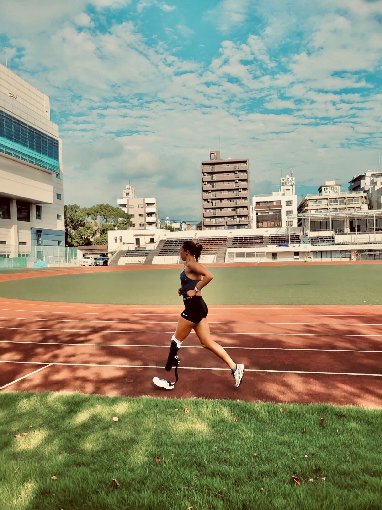 Grace Norman working out on the track at the Olympic Village in Tokyo. She competes Saturday evening (Dayton time) in the paratriathlon, the event where she won the gold medal at the 2016 Rio de Janeiro Paralympics. CONTRIBUTED