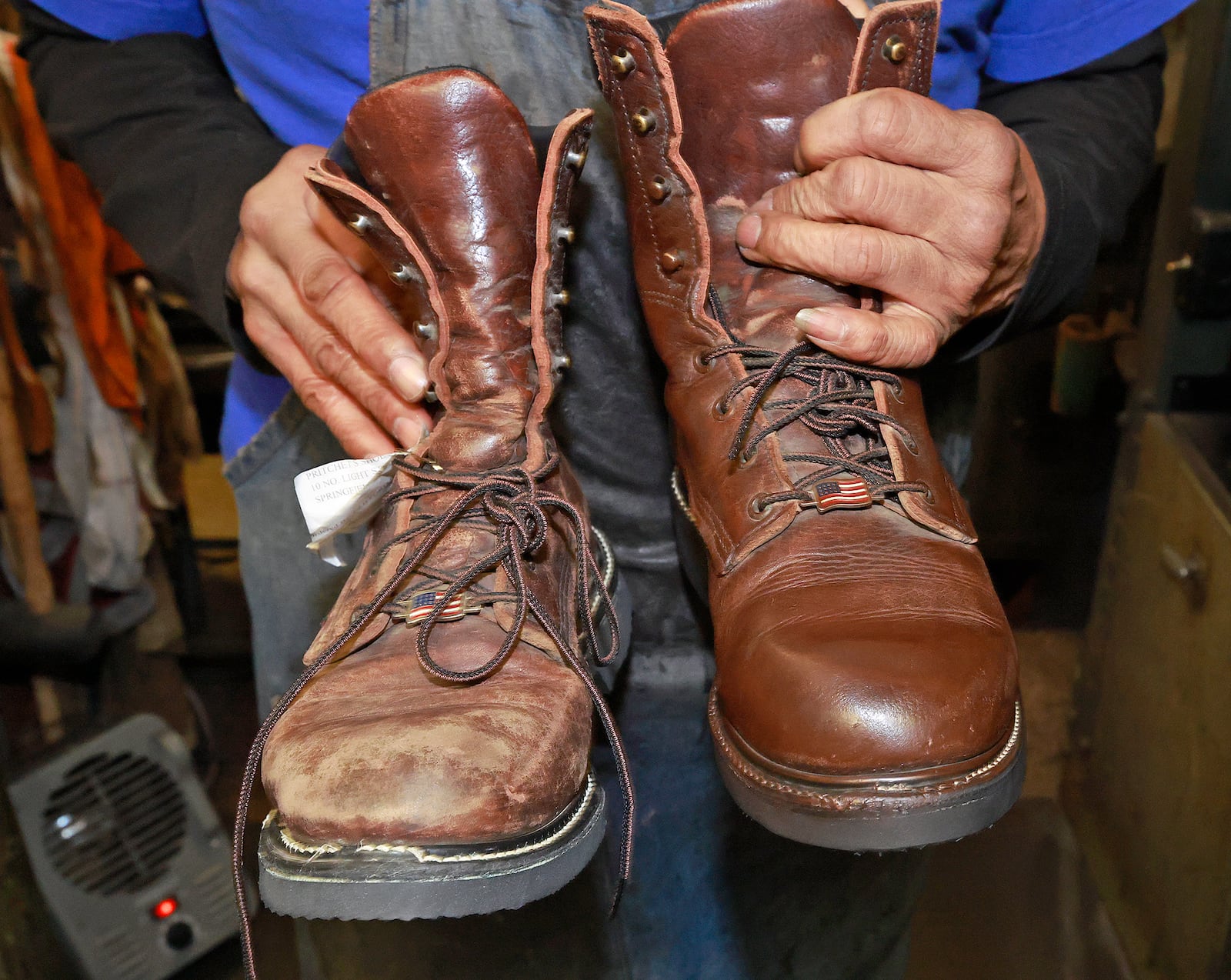 Before and after a pair of boots was repaired a polished. BILL LACKEY/STAFF