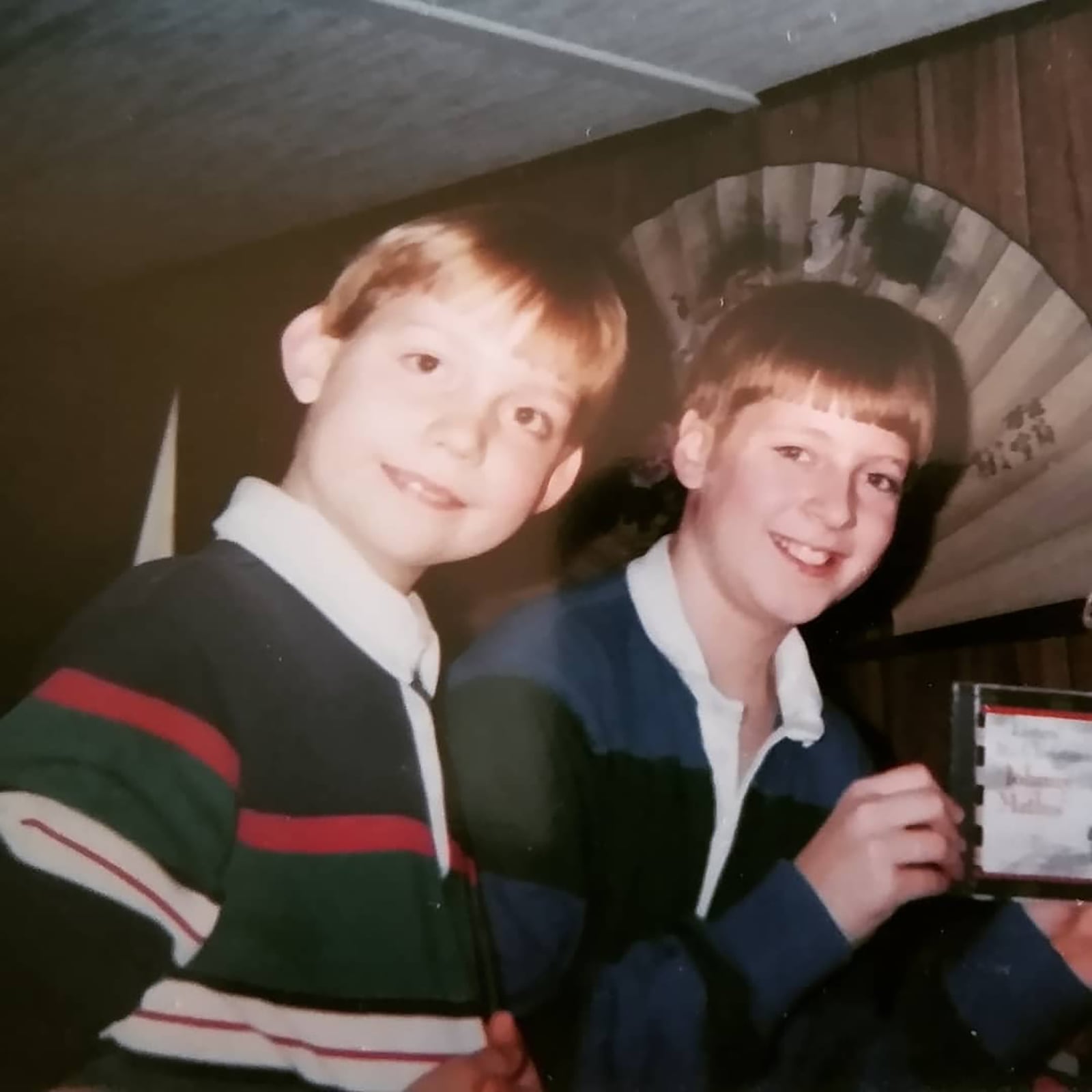 Joshua Lisec, left, and his brother Daniel were homeschooled while growing up in Englewood. They are shown at Christmas in 1999. CONTRIBUTED