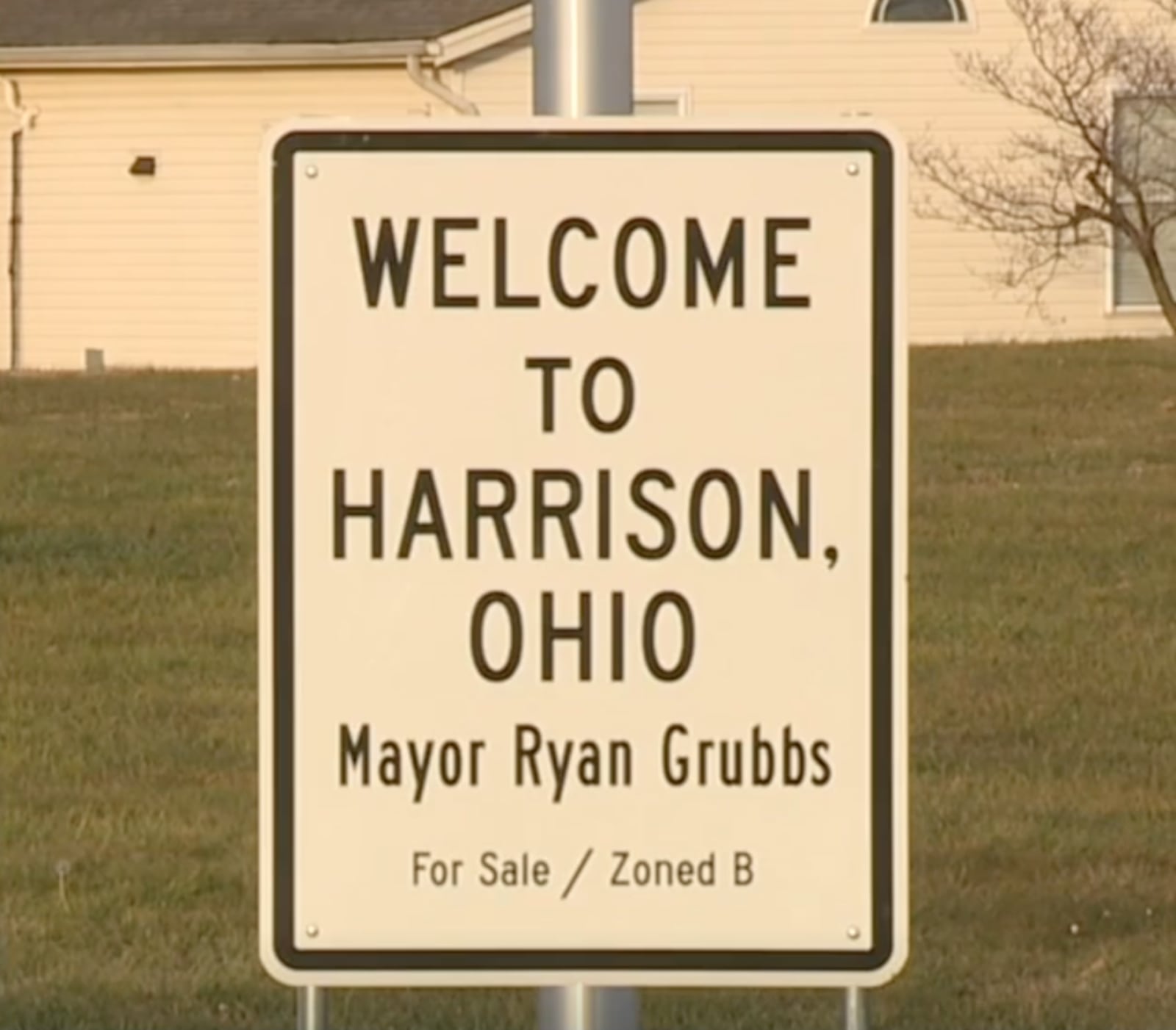 Someone put up a large Confederate flag and a "Welcome to Harrison" sign together on private property along a busy road in the southwest Ohio town as 2023 turned to 2024. WCPO photo