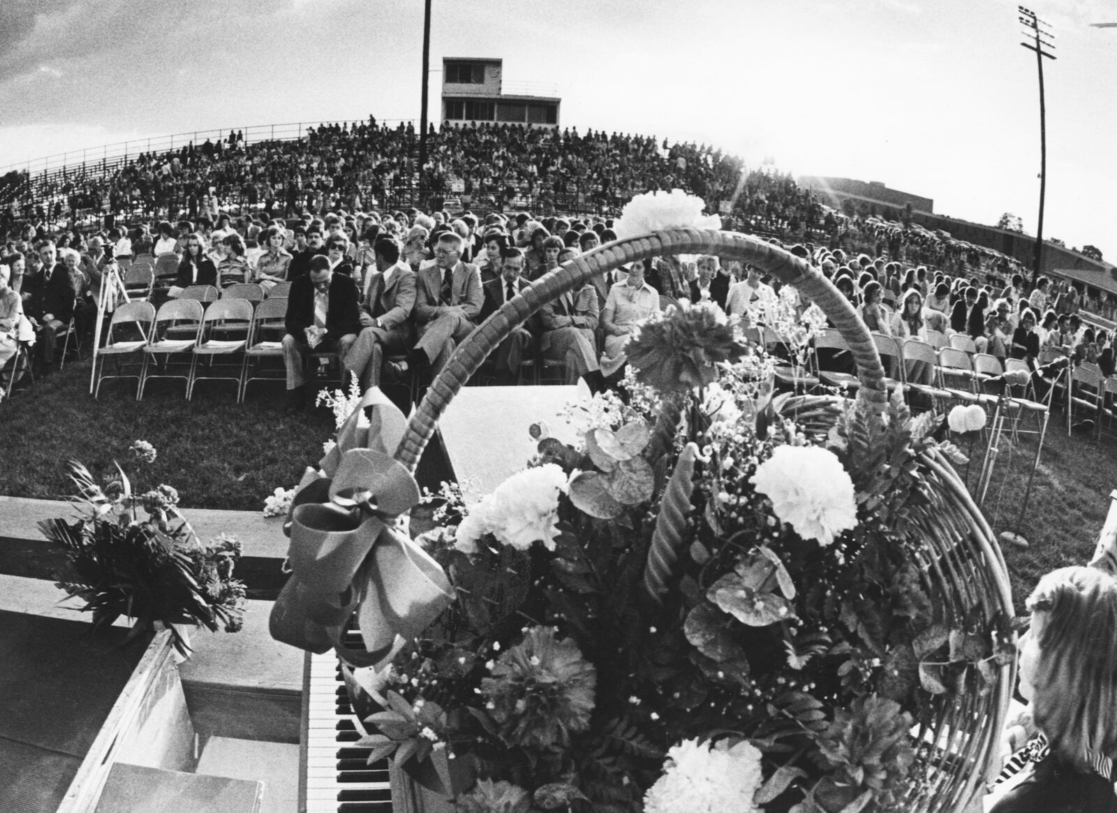 Memorial services are held for the victims of the Beverly Hills Supper Club fire at the Edgewood High School Stadium.