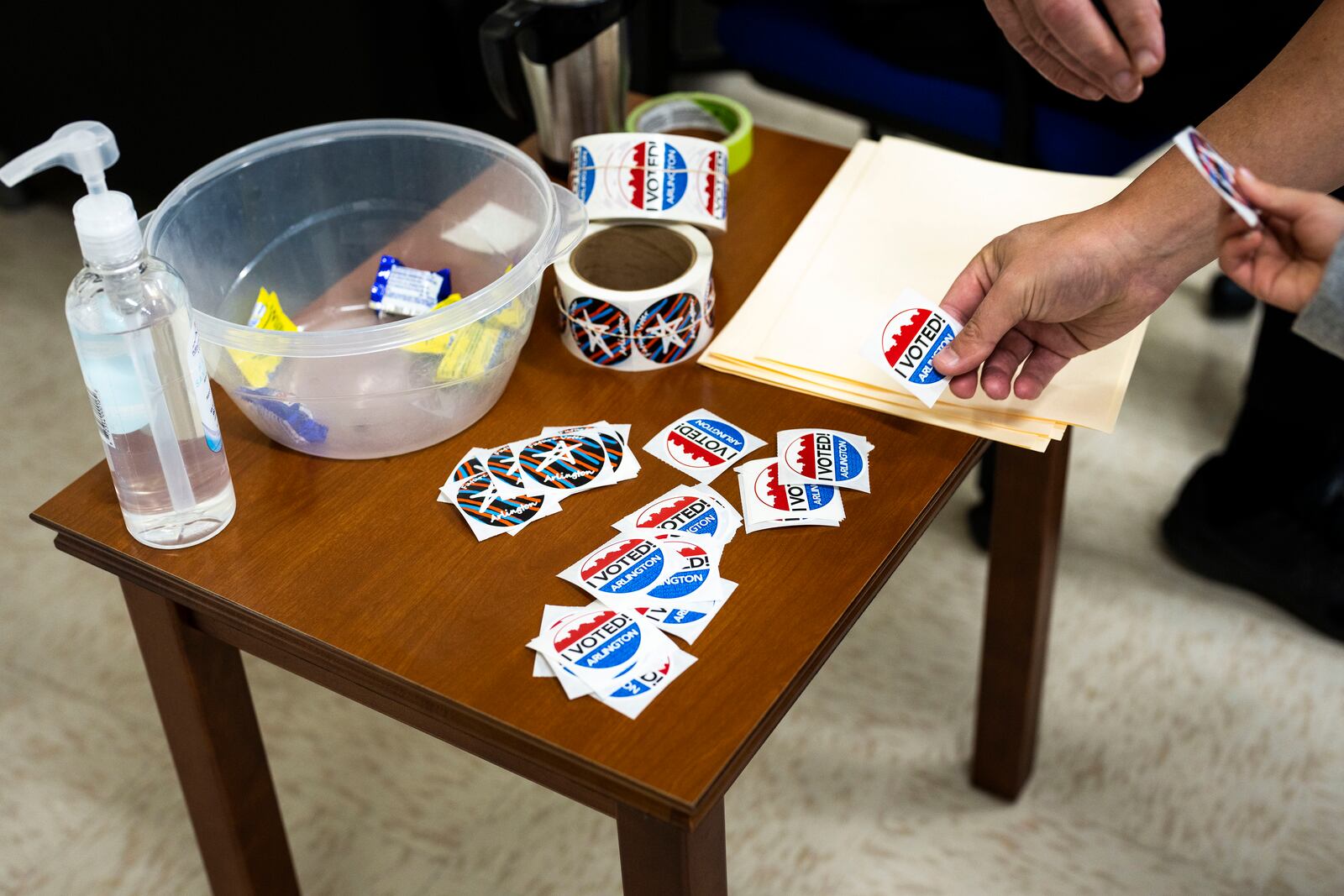 “I VOTED” stickers on Election Day at St. Agnes Church in Arlington, Va., Tuesday,  Nov. 2, 2021. Most of the political world’s attention on Tuesday will be focused on Virginia, where former Gov. Terry McAuliffe, a Democrat, is trying to return to his old office in a run against Glenn Youngkin, a wealthy Republican business executive. (Doug Mills/The New York Times)