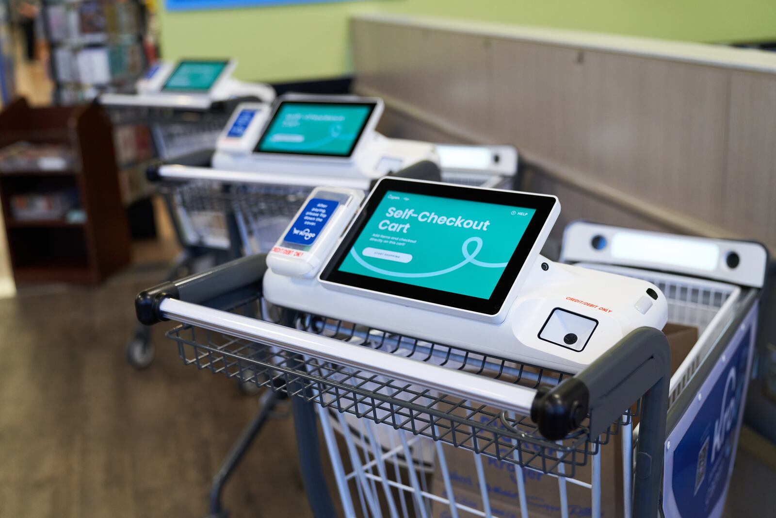 The Monroe Kroger now offers 10 new KroGO shopping carts, which allow shoppers to scan as they go and the ability to avoid the checkout. CONTRIBUTED